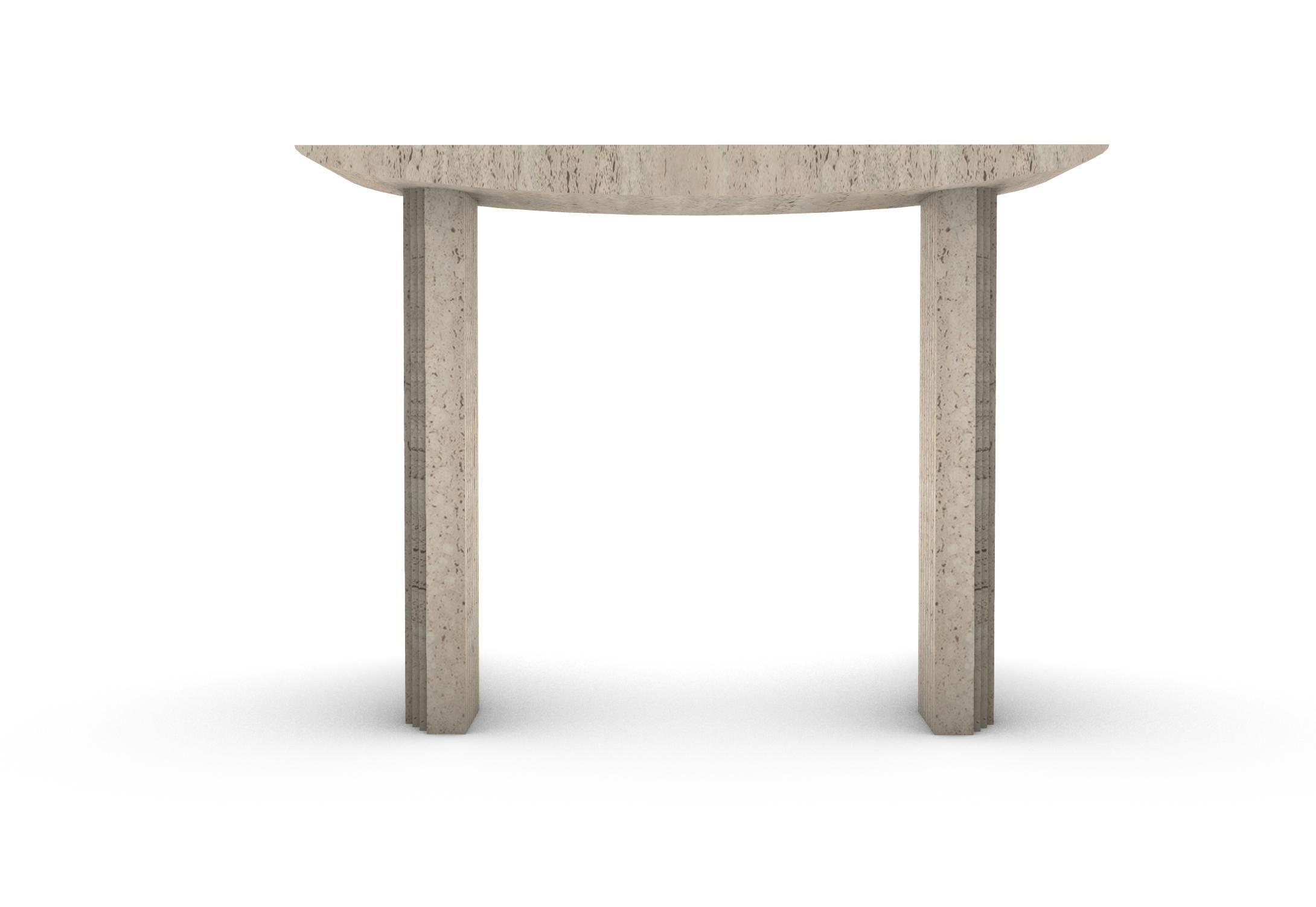 “Console 0024c” is a sculptural console table  in Travertine created by the artist Desia Ava. 
The piece features strong lines and gentle curves. Marked by architectural aesthetics, on the borderline between sculpture and furniture the Travertine