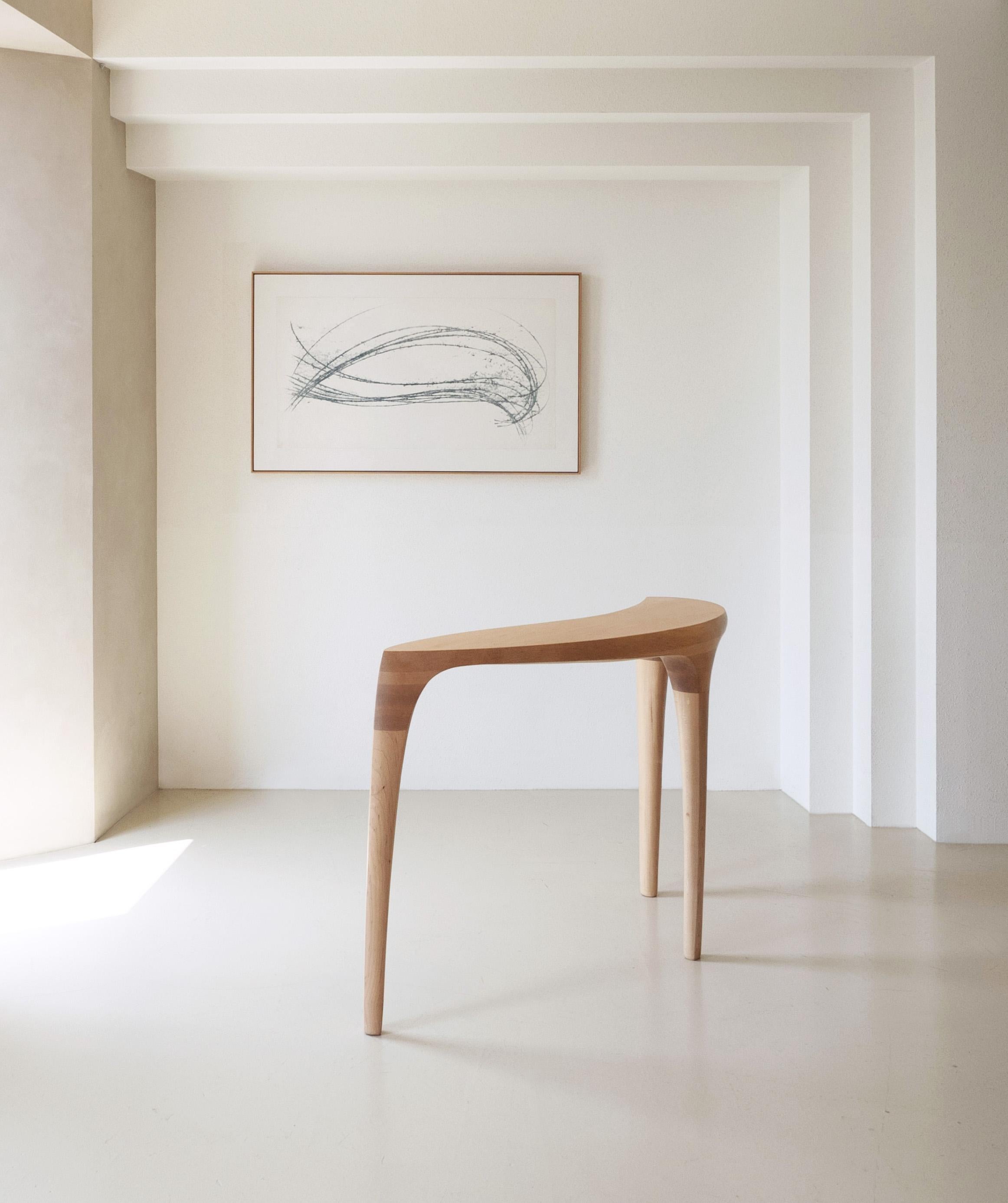 'Momentum Table' by Soo Joo is an Organic Modern sculptural console table in Hard Maple wood. The artist creatively reimagines the essence of traditional Korean aesthetic into a modern minimal context in this piece. 

It has a timeless, distilled