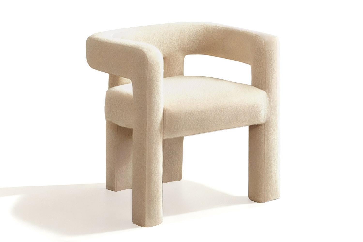 The Brutal Armchair is a celebration of radical form and unapologetic presence. With its chunky silhouette, bold cylindrical legs, and striking cut-out backrest, it fuses brutalist architecture with soft, inviting tactility. The result is a