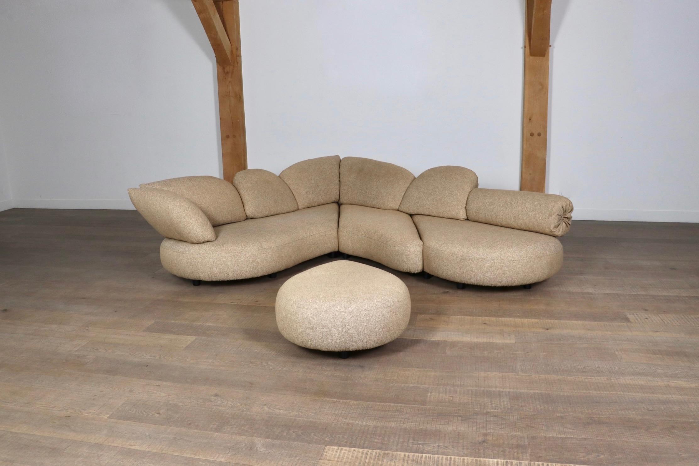 Amazing, organic shaped sofa by Wiener Werkstätte, Austria 1970s. A rare custom made design in the 1970s with each sofa to be a masterpiece. These one-of-a-kind sofas are to be recognized by its rounded organic shaped cushions laid out in a playful,