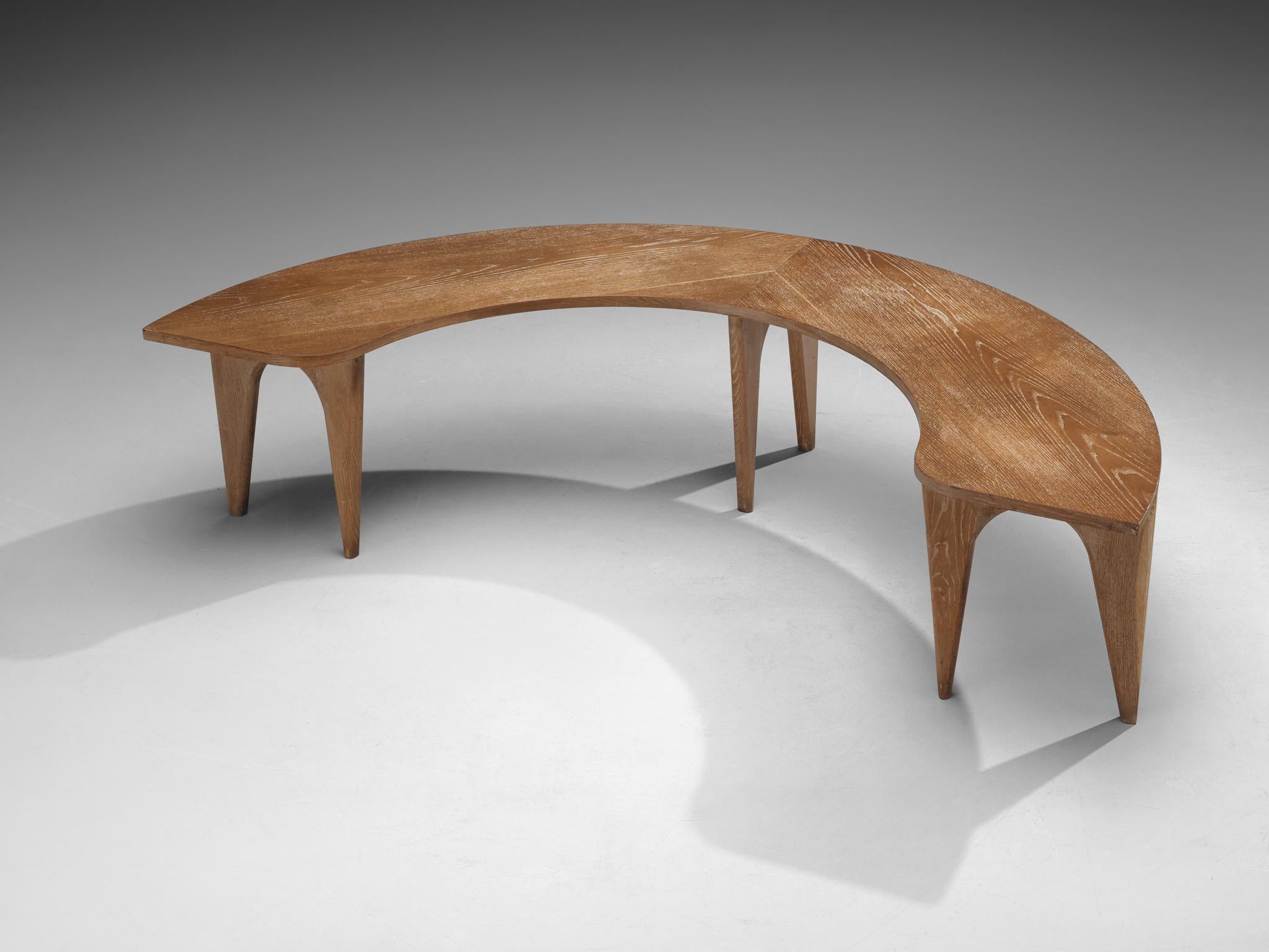 Large side or coffee table, cerused oak, Europe, 1960s

This eccentric large display table or coffee table is made in a precise manner, implementing geometrical shapes and straight lines that contribute to its architectural appearance. In the highly