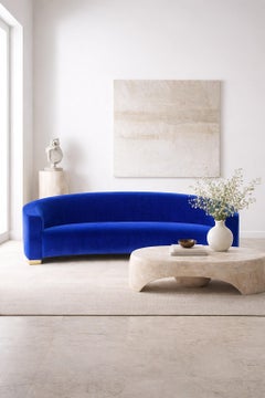 Sculptural Curved Velvet Sofa Featuring a Brushed Brass Plate Footer