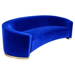 Sculptural Curved Velvet Sofa Featuring a Brushed Brass Plate Footer