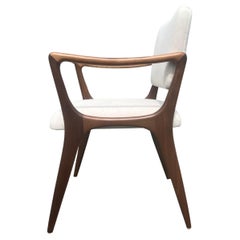 Poltrone da pranzo scultoree nello stile di Gio Ponti in noce