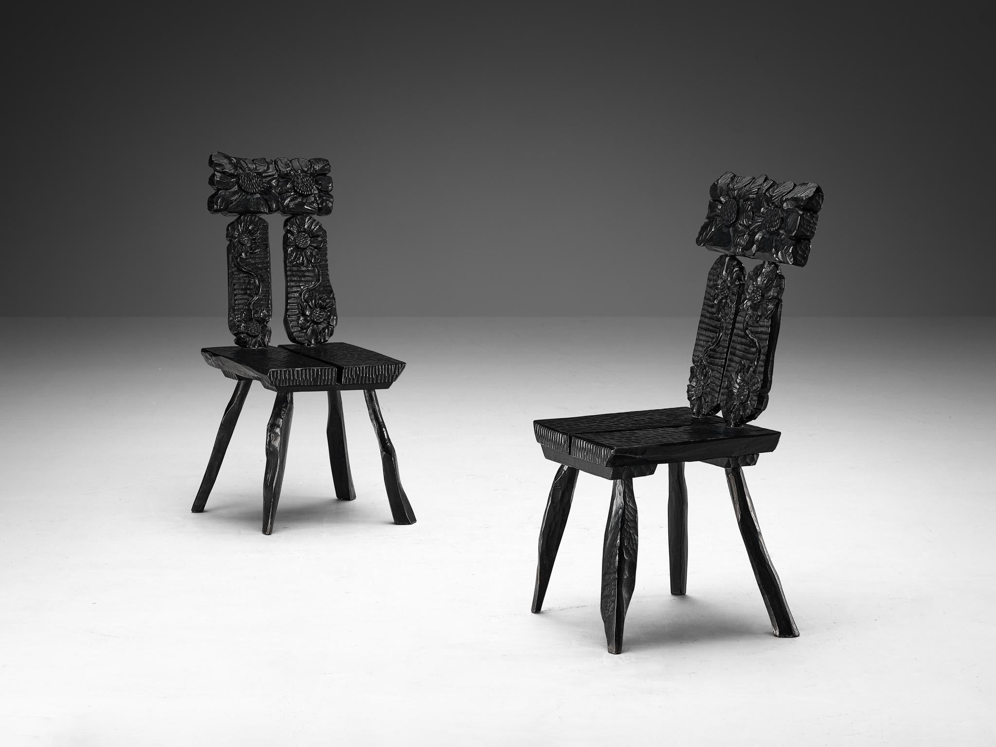 Dining chairs, lacquered wood, France, 1970s

Crafted with unparalleled artistry, these dining chairs epitomize exquisite craftsmanship with meticulously carved details that draw inspiration from nature. These chairs exude an enchanting charm