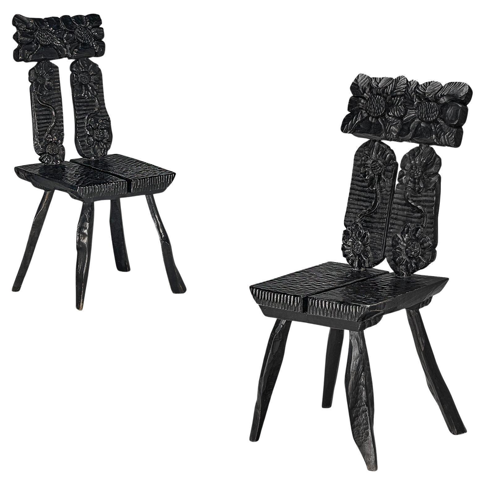 Sculptural Dining Chairs in Black Lacquered Wood with Decorative Carvings  For Sale