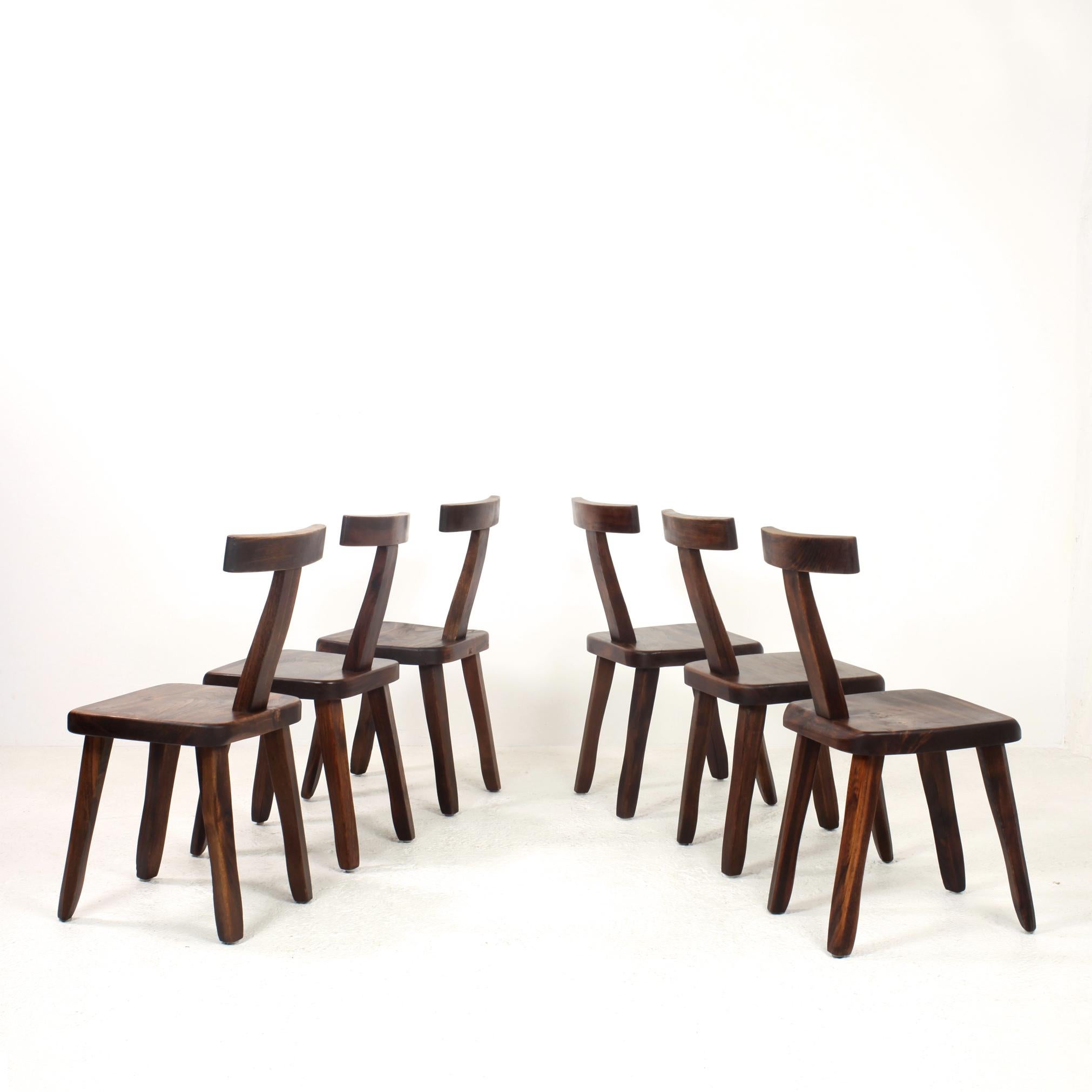 Set of six vintage and sculptural T-chairs by Olavi Hänninen for Mikko Nupponen, 1950s in solid elm.
Nice patina. 



