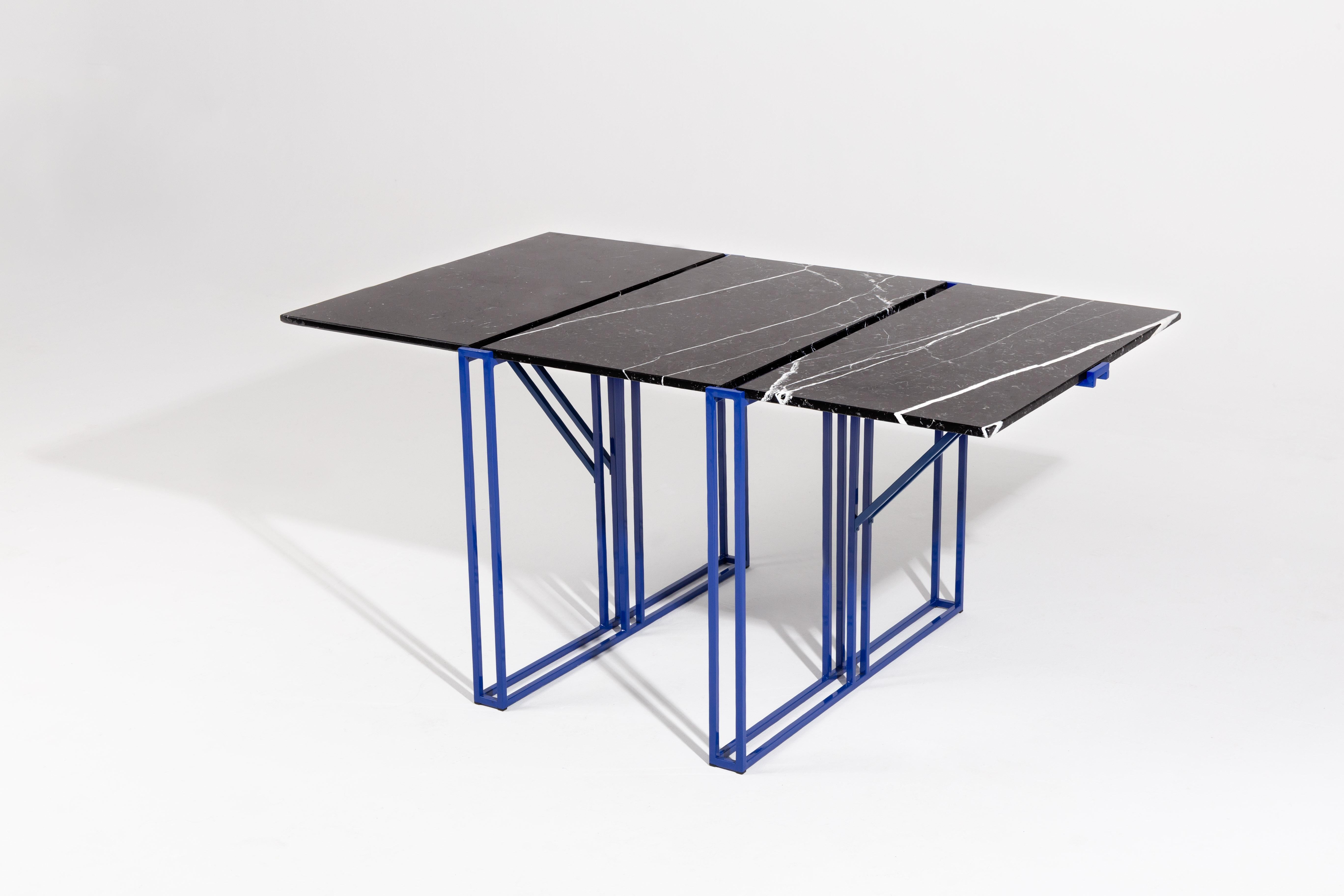 Sculptural dining table by Ángel Mombiedro
Measures cm: 133 x 172 x 80 cm.
Inches: 52.5 x 68 x 32 in.
RAL metallic structure with natural Markina black and white marble shelves.
Can be made to order in other colors/dimensions upon