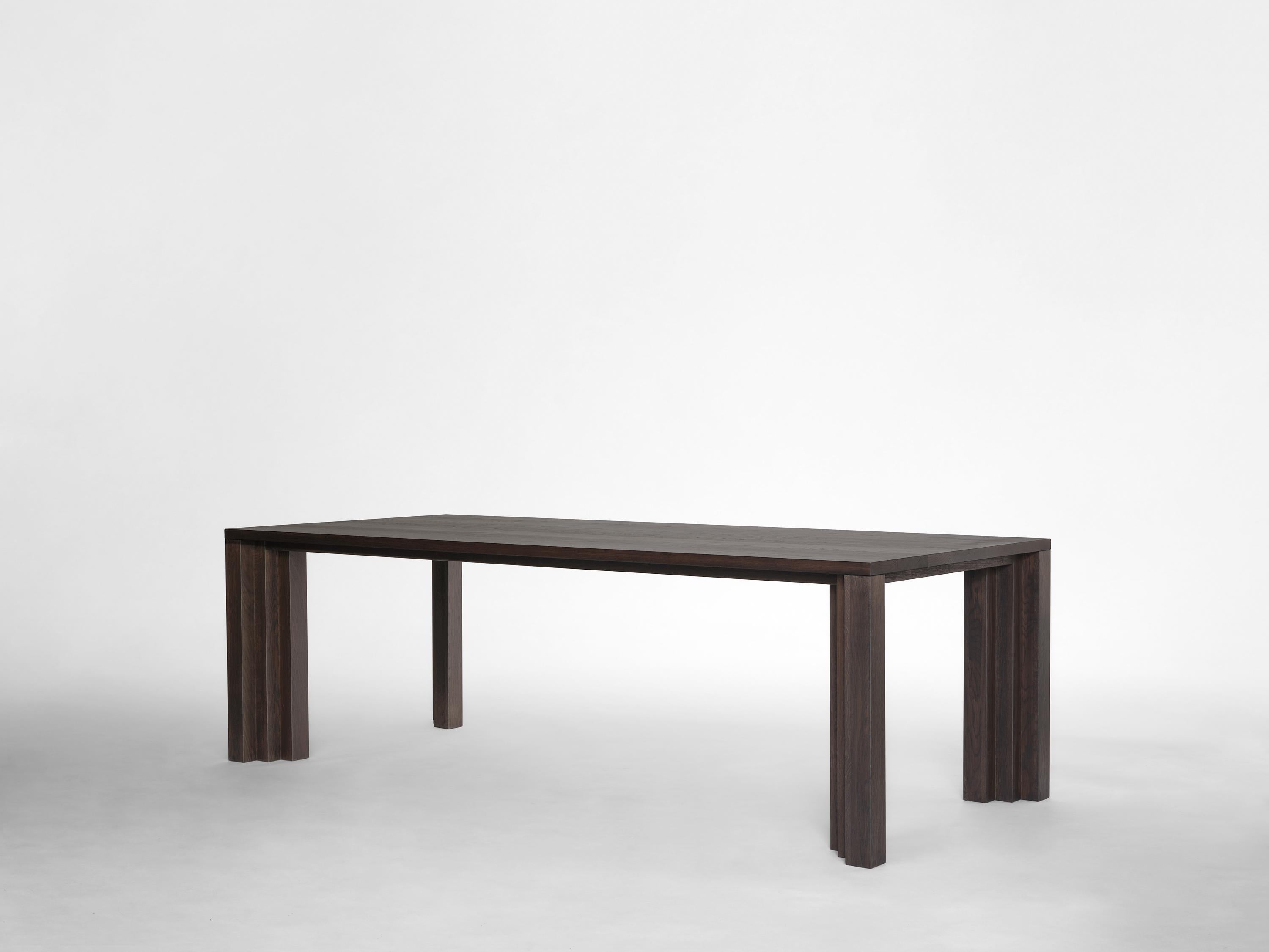 The Cadence table is inspired by the simplicity and power of the rhythmic stepped brickwork visible in the architecture of Amsterdam's 'South Plan' area; the city development plan designed by H.P. Berlage in 1915. A flow of rhythmic volumes and