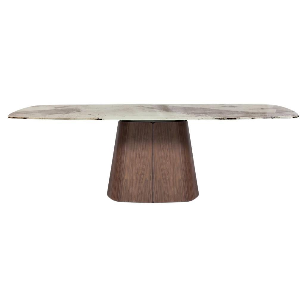 Tavolo da pranzo scultoreo a forma di piano ovale, piano in ceramica/base in noce