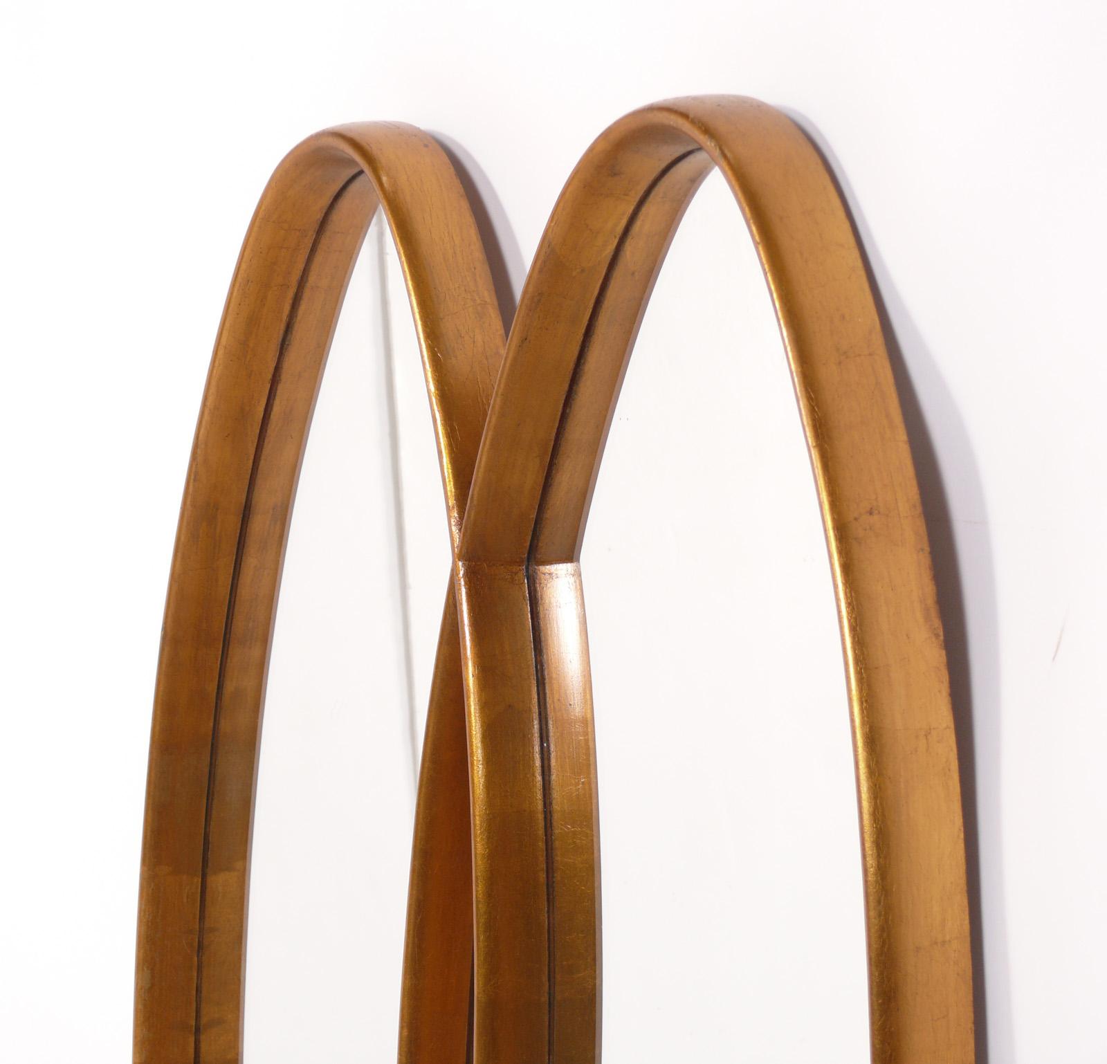 Mid-Century Modern Miroir sculptural double ovale doré  en vente