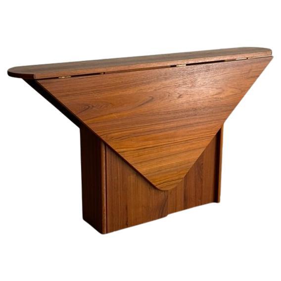 Sculptural drop leaf teak dining table made in Denmark 1960's For Sale