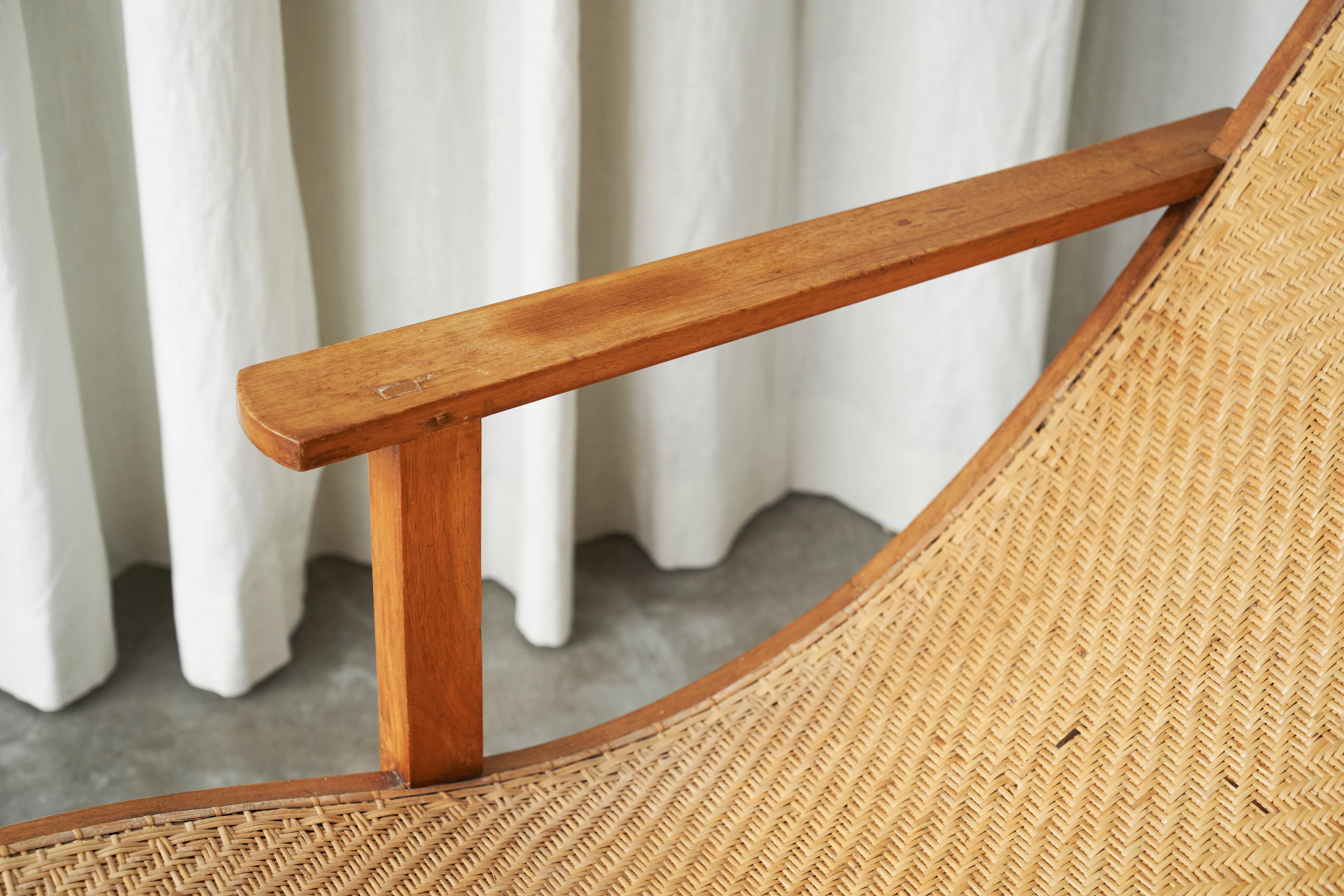 Sculptural Early Dutch Colonial Chaise Longue in Wood and Hand Woven Cane 1920s 3