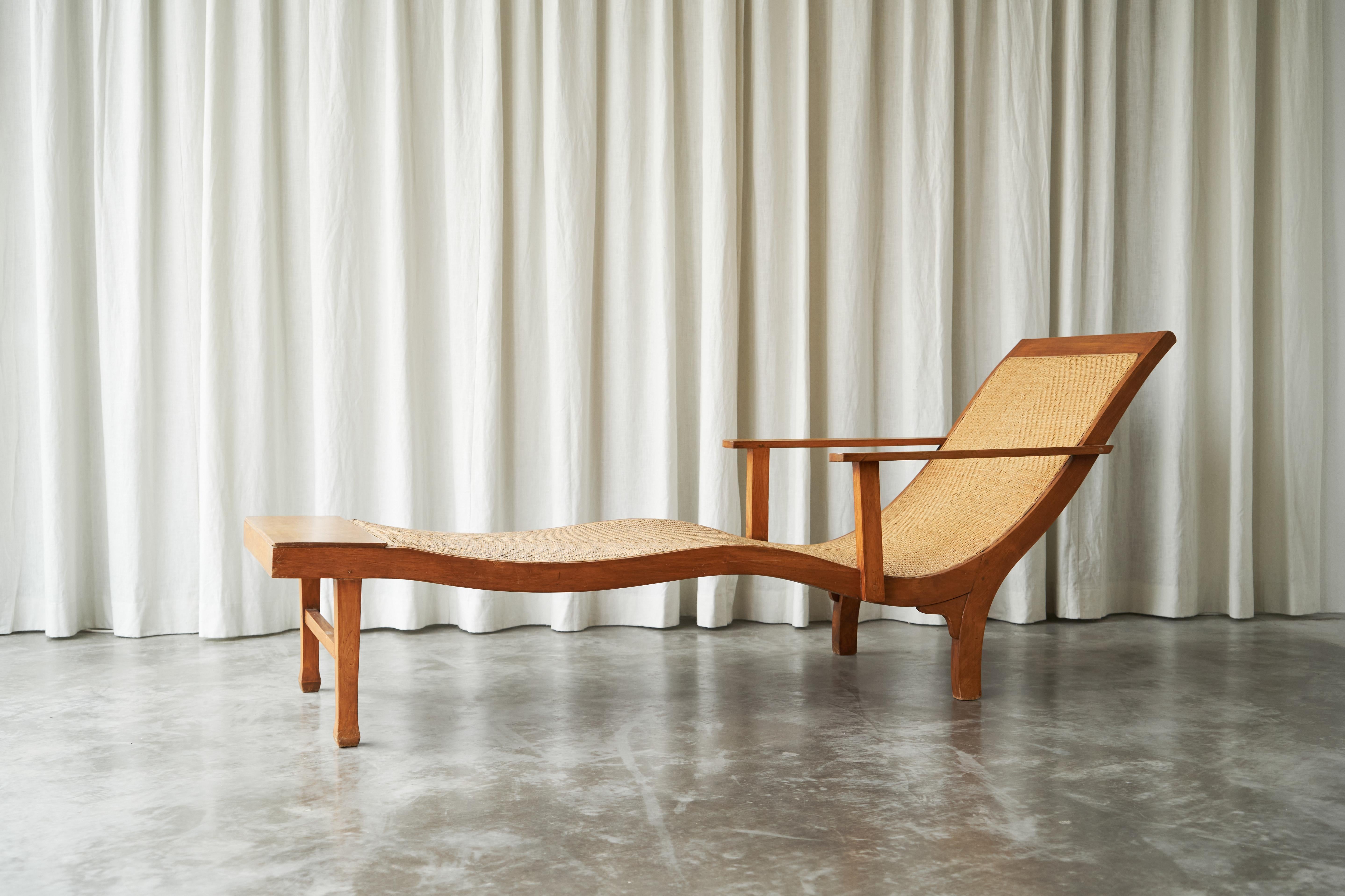 Sculptural Early Dutch Colonial Chaise Longue in Wood and Hand Woven Cane 1920s 4