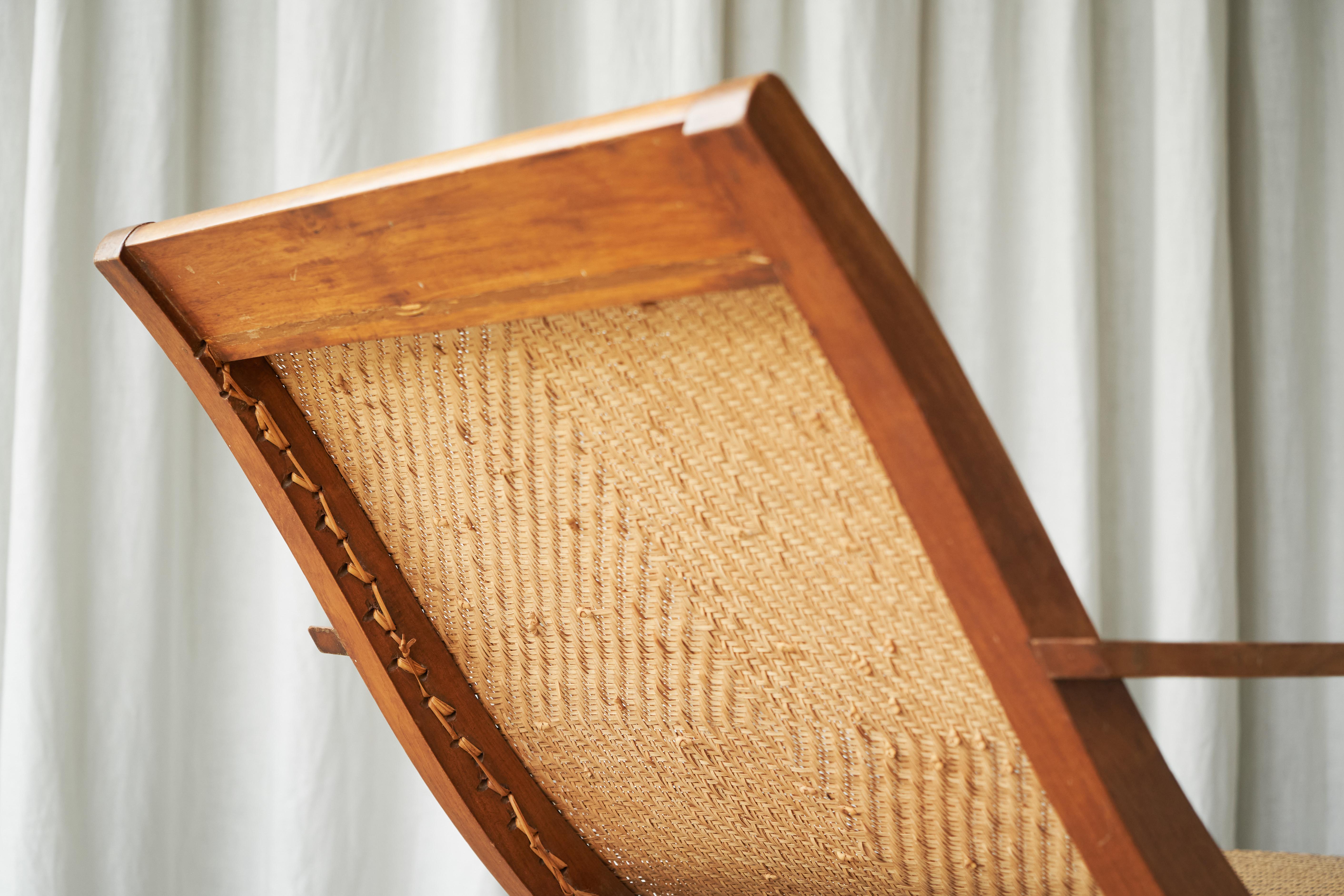 Hand-Crafted Sculptural Early Dutch Colonial Chaise Longue in Wood and Hand Woven Cane 1920s