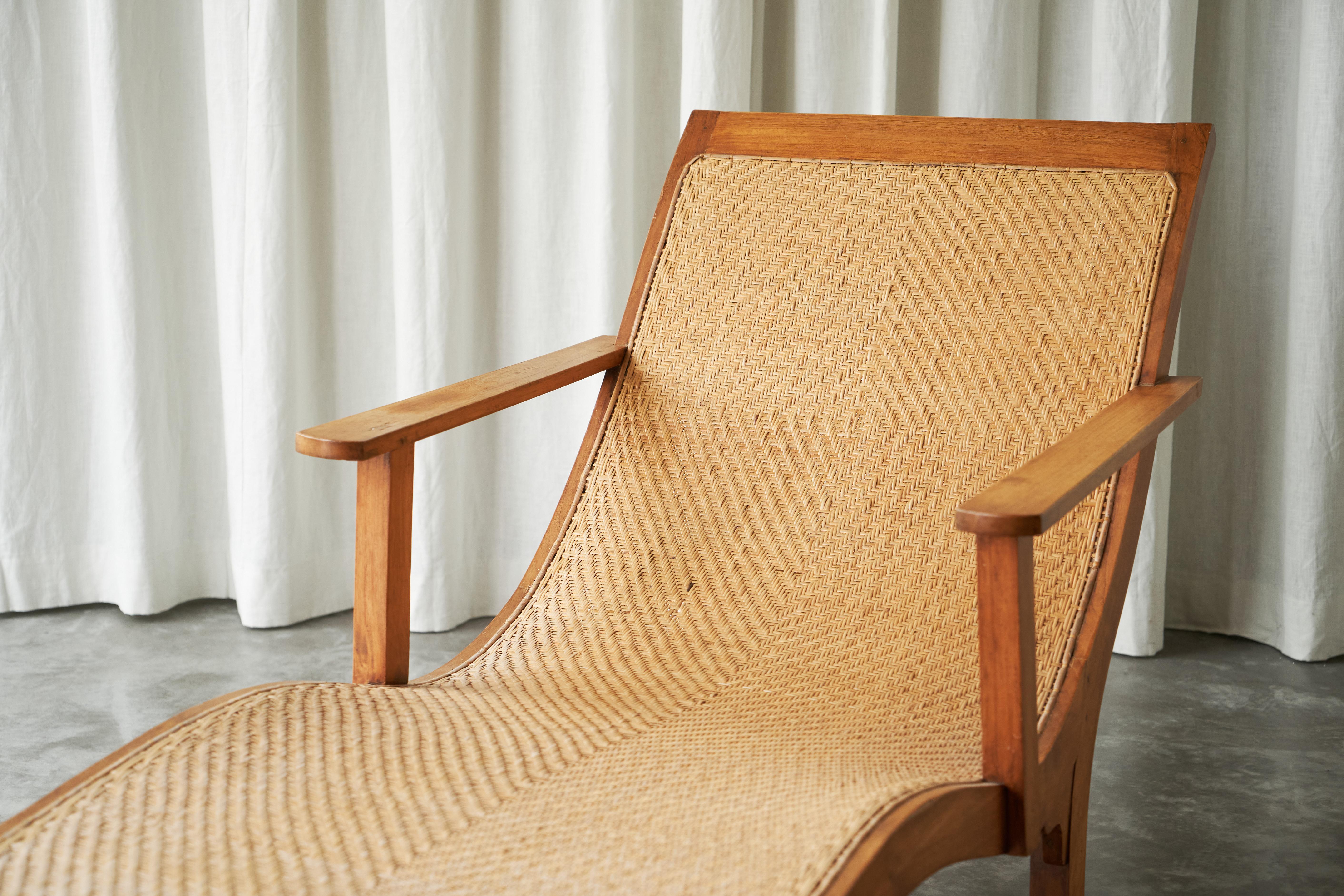 Sculptural Early Dutch Colonial Chaise Longue in Wood and Hand Woven Cane 1920s 1
