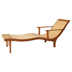 Skulpturale Chaise Longue aus Holz und handgeflochtenem Rohr aus der frühen niederländischen Kolonialzeit 1920er Jahre