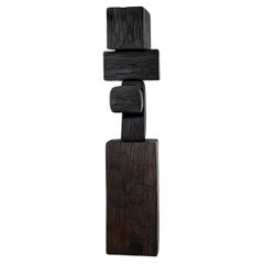 Eleganza scultorea Forza inedita #53: il tavolino in legno massiccio di Joel Escalona