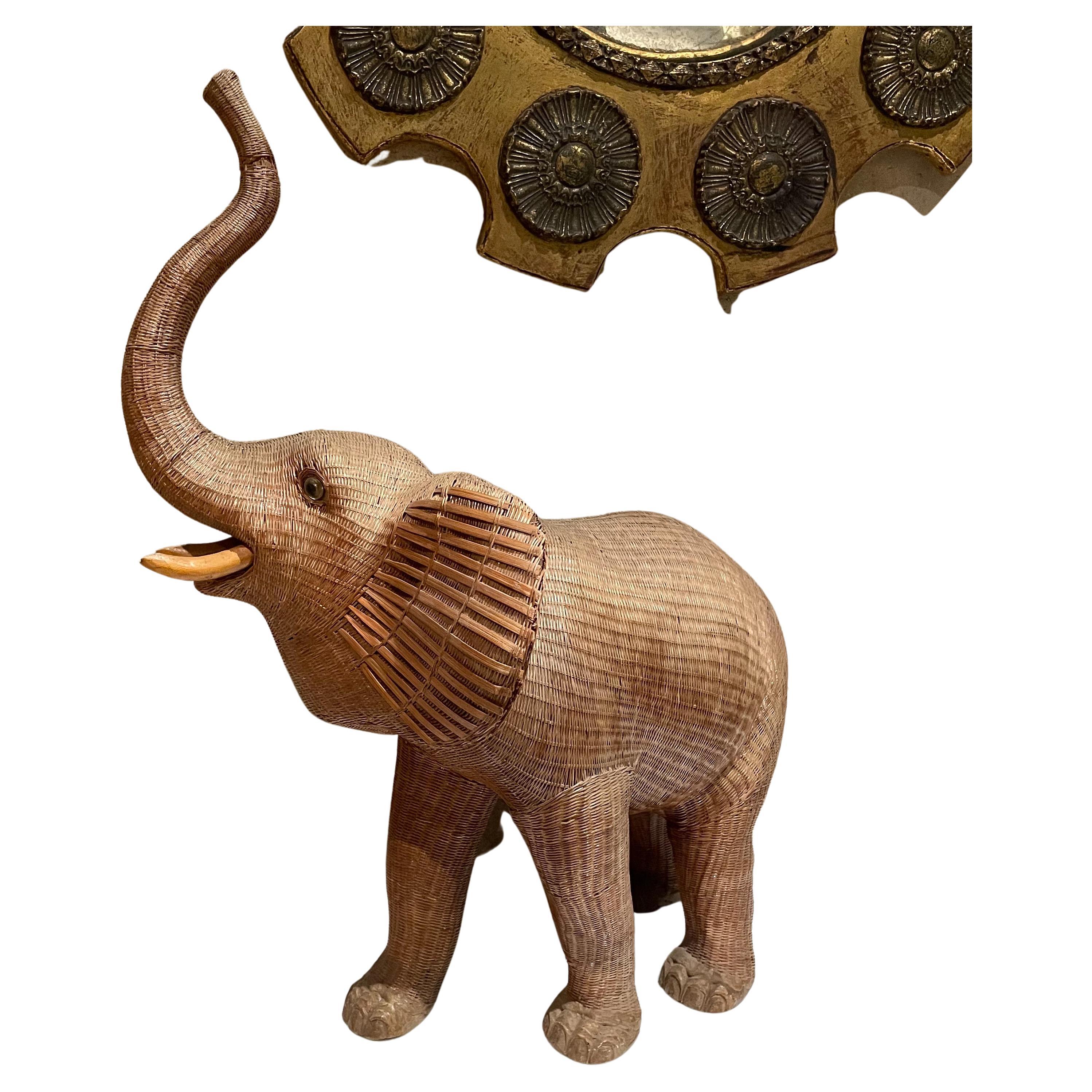 Sculptural Elephant Stash Box
Antique Elephant Wicker Box Hollywood Regency Period style similar to Mario Lopez Torres
Unknown maker. 
The elephant's head can be removed to open the secret stash box.
Dimensions: 20