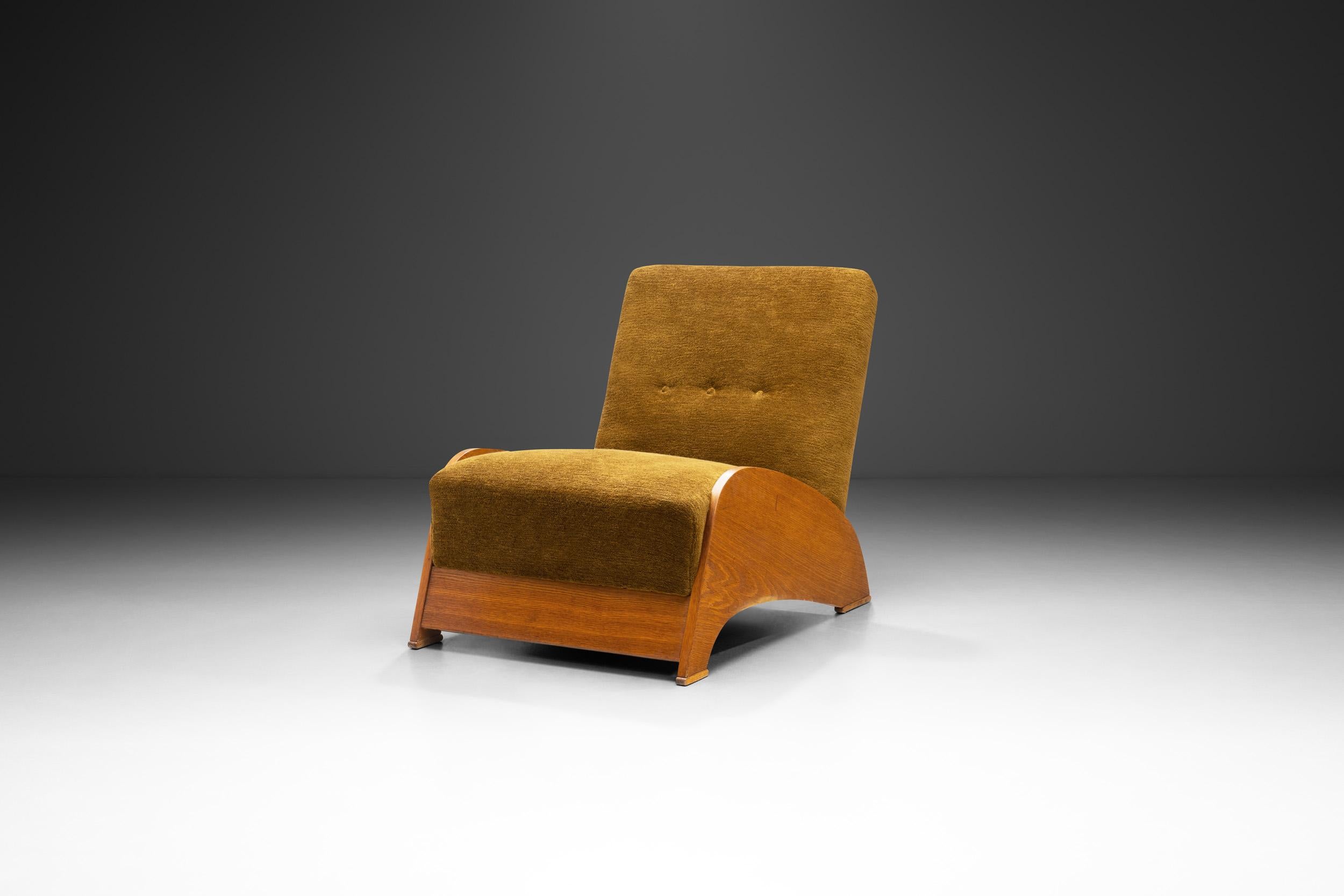 In the inventive and experimentative ethos of 1960s Europe is materialized in this remarkable lounge chair. This sculptural oak chair can be seamlessly integrated into any aesthetic thanks to its artistic impression. This unique mid-century marvel,