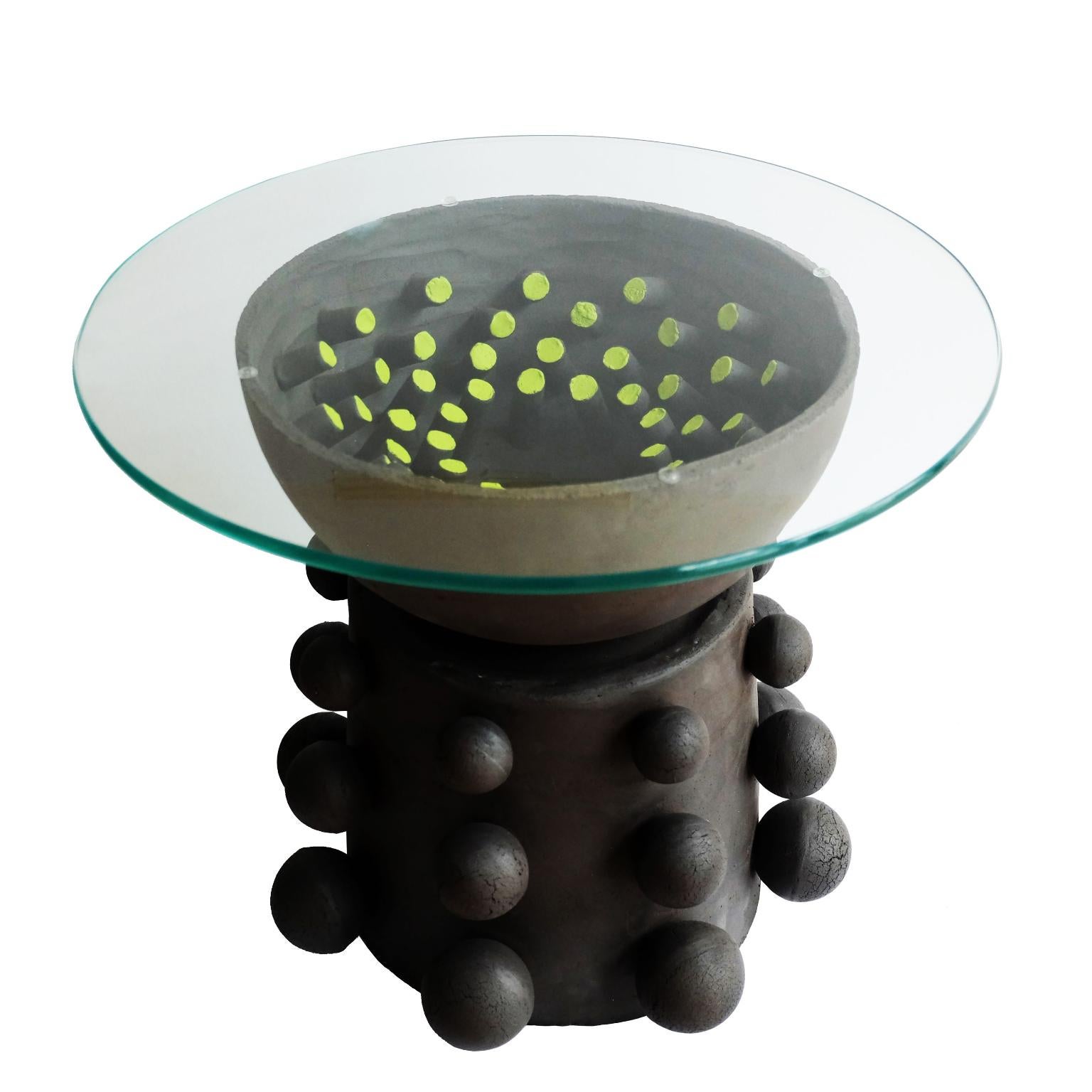 Sculptural Fibrobla table by Ia Kutateladze
Dimensions: W 35 x H 44 cm
Materials: Raw Black Clay, Glass

“Playground For Salvation” was created entirely during quarantine, in my Berlin studio. The stillness of the lockdown enabled me to