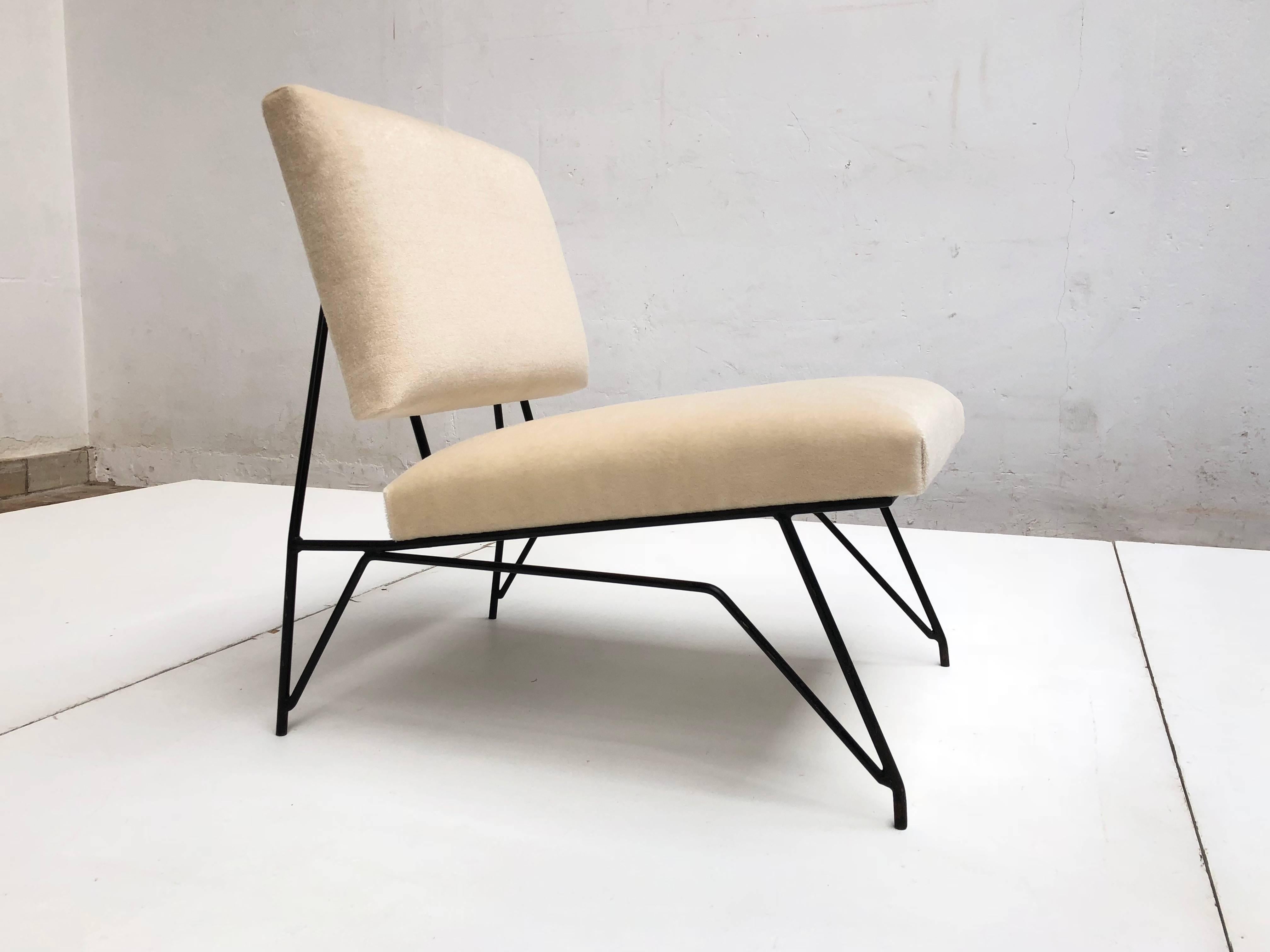 Exquisite and super rare sculptural form mohair lounge chair attributed to Ravegnati & Vicenzi for D'arbo, Italy circa 1951-1955. The beautifully crafted enameled steel rod frame resembles the Avant Garde sculptural designs of Mario Ravegnati &