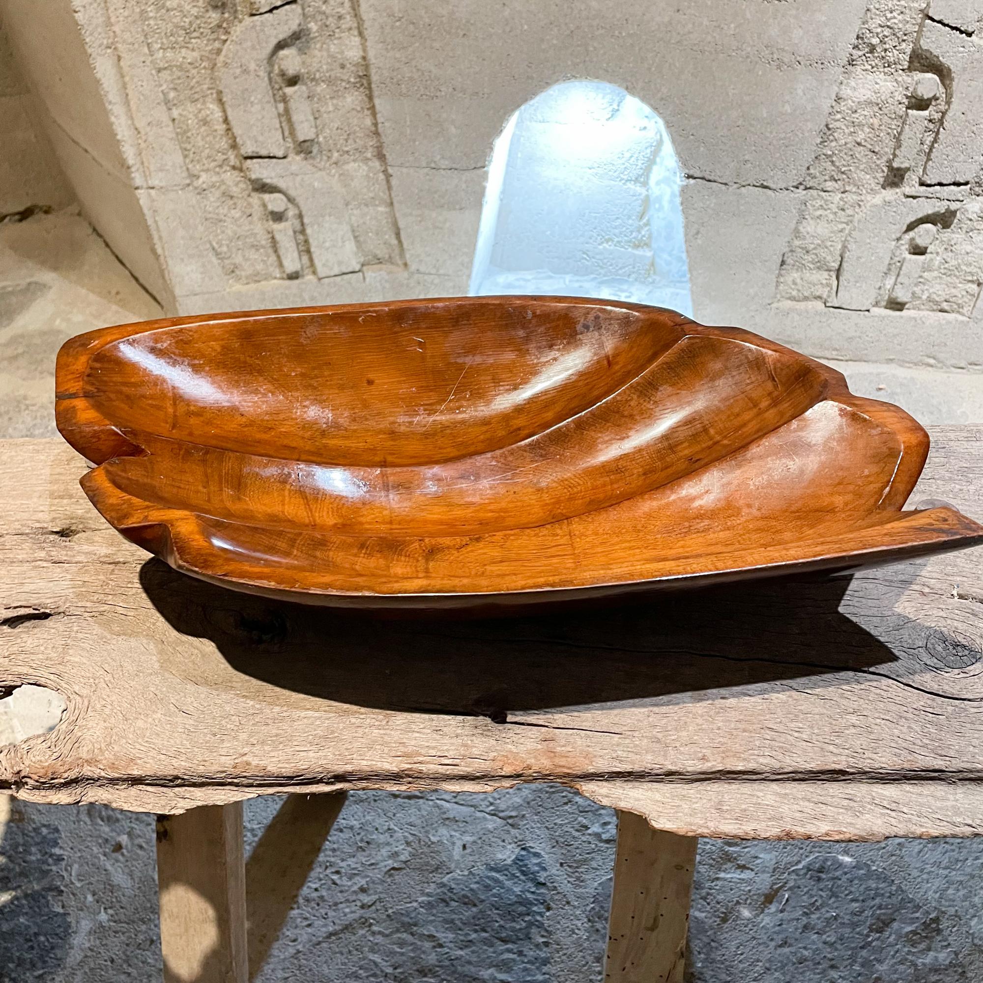 Sculptural free form wood fruit bowl organic modern from Mexico, 1970s
In the manner of Don S Shoemaker. Unmarked.
Measures: 19.5 W x 10.5 D x 3.5 H inches
Preowned unrestored original vintage presentation and condition.
Refer to our images