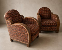 Bergeres escultóricos art déco franceses en nogal figurado, hacia 1930