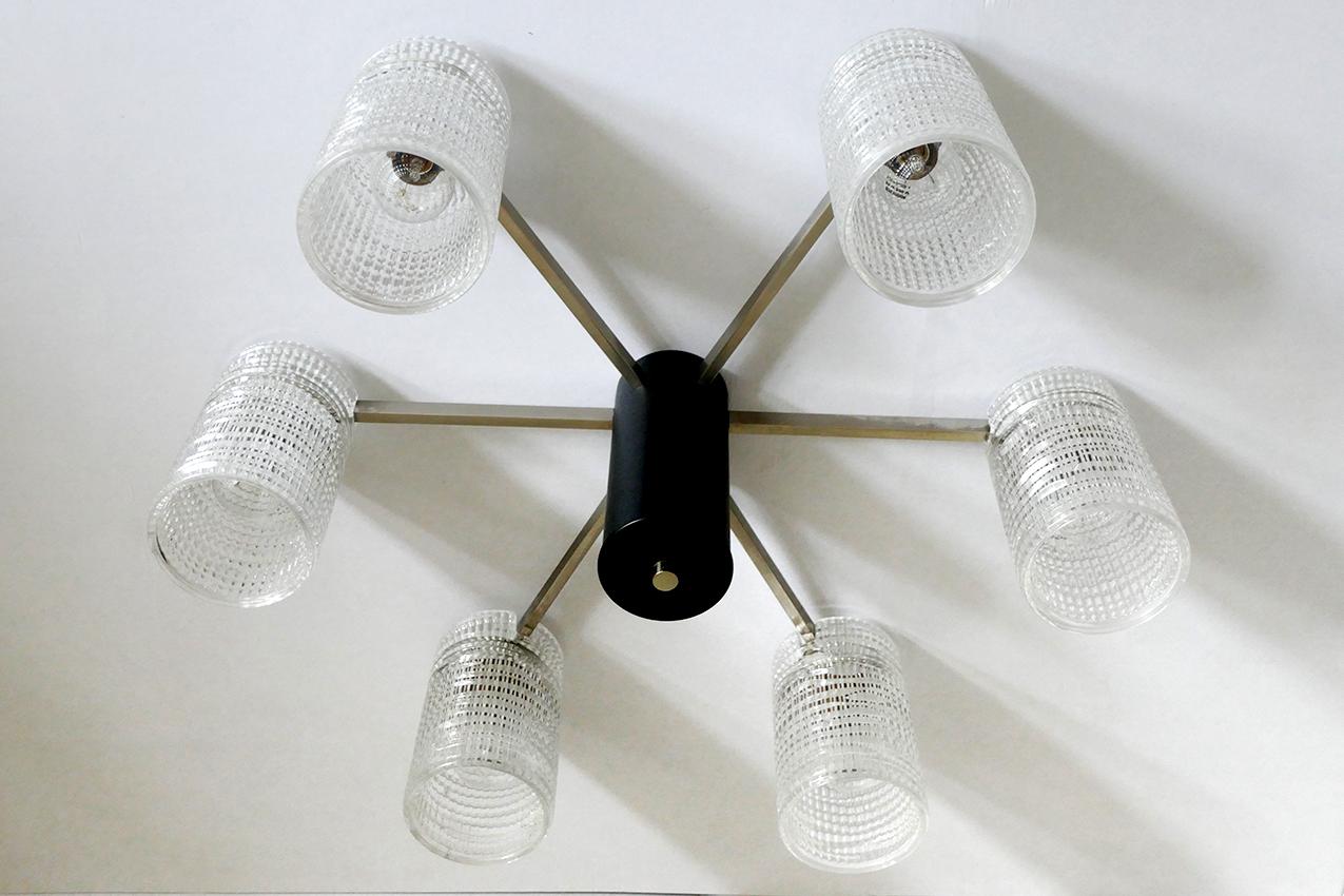 Vintage Sputnik - Orbit chandelier with six massive textured glass tubes.
France, 1960s.
Lamp sockets: 6.