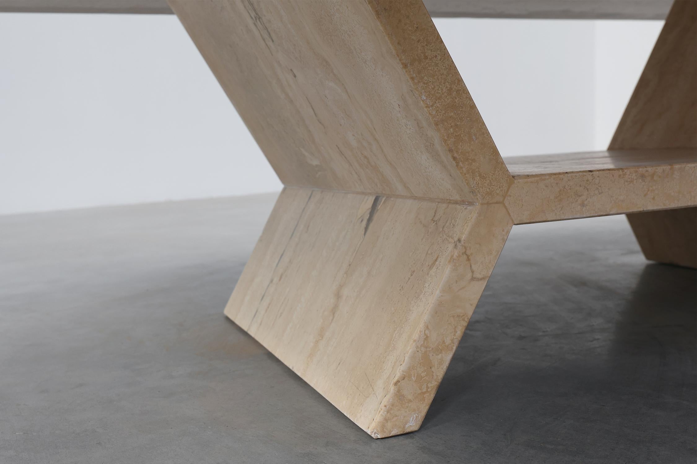Italy / 1960 / coffee table / travertine / Mid-century / Vintage

A sleek, sturdy and artfully geometric travertine coffee table, crafted in the 1960s in Italy. The geometric base balances form and function, providing both support and a striking