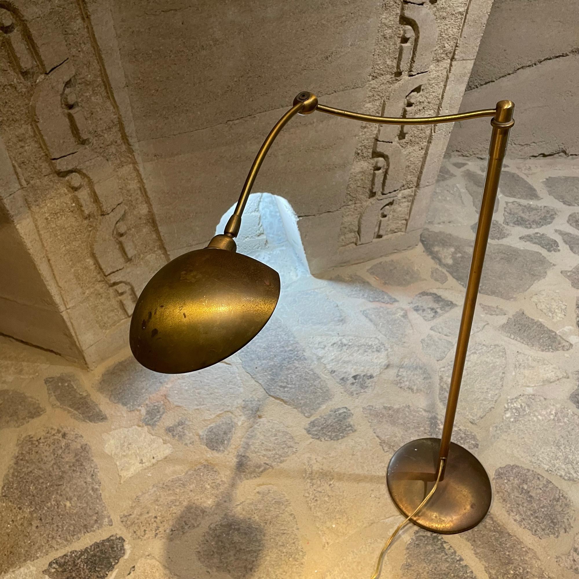 Holtkotter Leuchten of Germany
Vintage Chair Reading Pharmacy lamp swing arm floor lamp with dimmer present.
Fantastic quality. Patinated brass floor lamp. Maker Holtkotter stamp present.
Of the Bauhaus tradition by founder Franz Holtkoetter