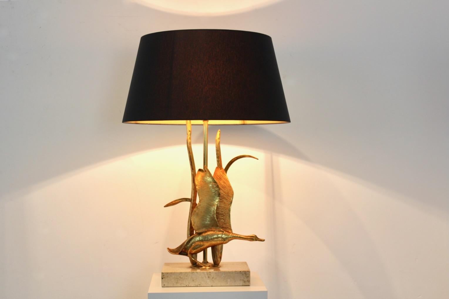 A truly eye catching, unusual Gilt Metal Table (or Floor) Lamp, fashioned in the shape of a Wild Duck. Designed in the style of Maison Jansen and produced circa 1970s in Belgium. The Wild Duck has a beautiful original Patina and the lamp is In very