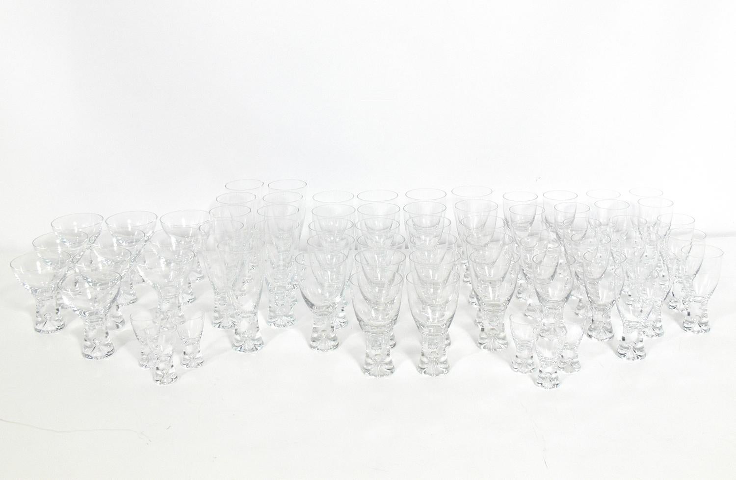 Sculptural glassware set, designed by Tapio Wirkkala for Iitala, Finland, circa 1960s. Very hard to find an original vintage set with this many pieces. This large set consists of 68 pieces total, including six 3.25