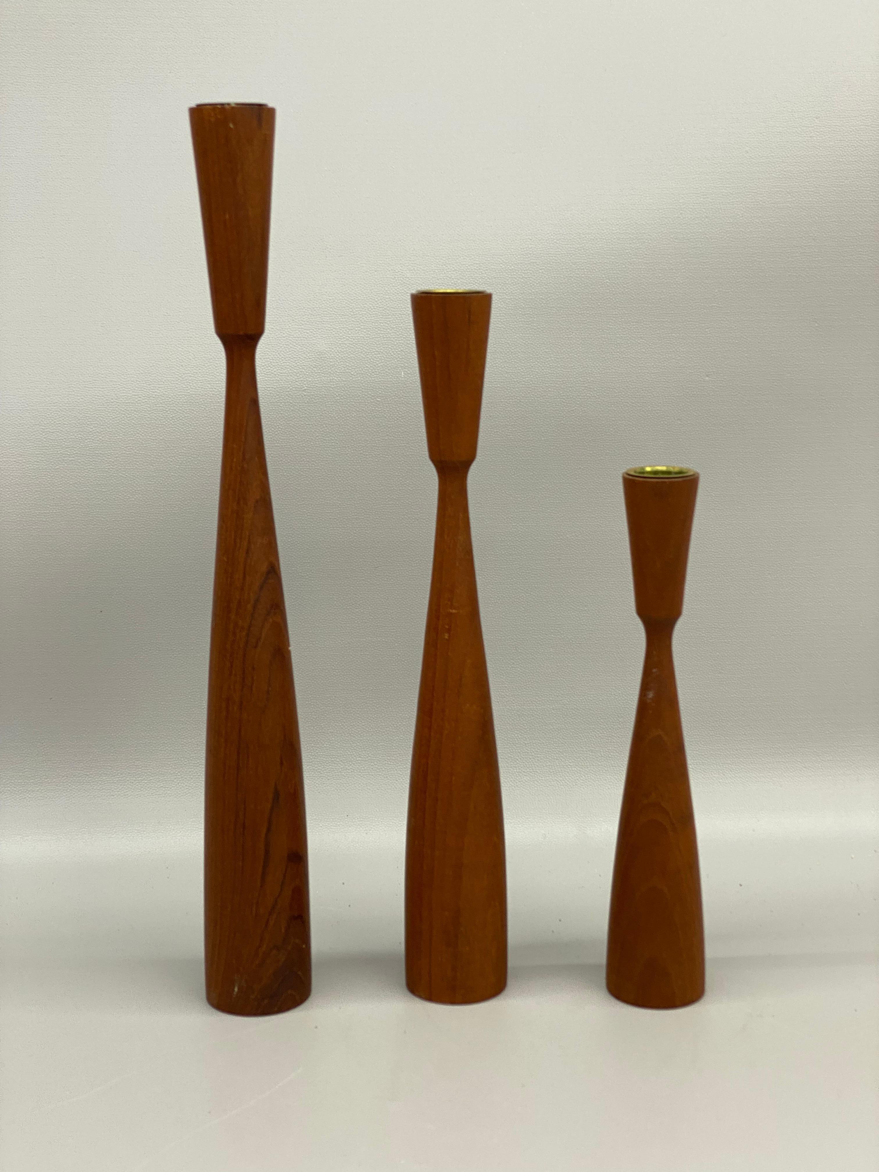Scandinavian Modern Sculptural Graduated Danish Modern Teak Candlesticks, Set of Three For Sale