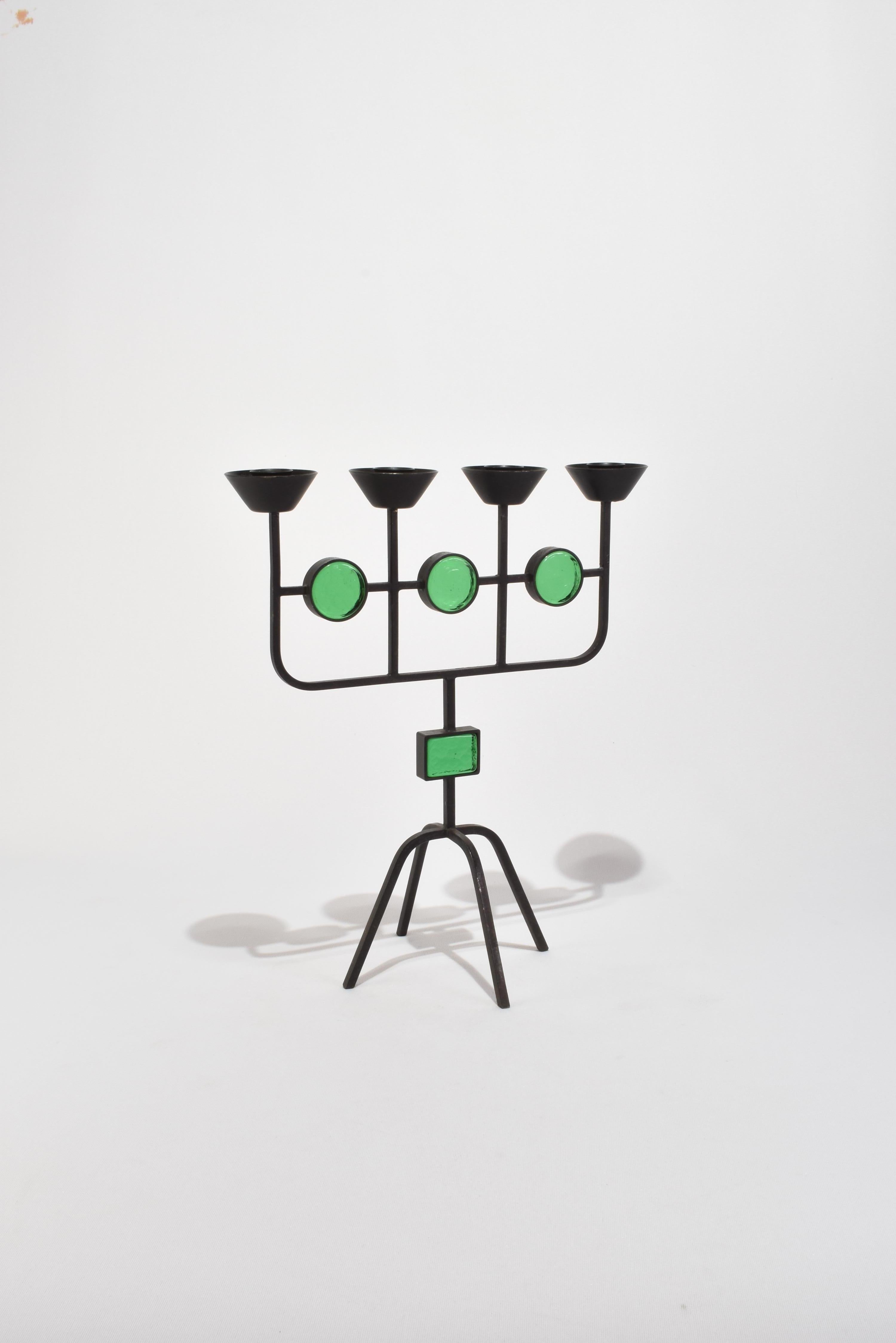 Rare, vintage sculptural candelabra attributed to Gunnar Ander for Ystad-Metall, ca. 1950s. Wrought iron frame with geometric green glass detail and four flared holders. 

