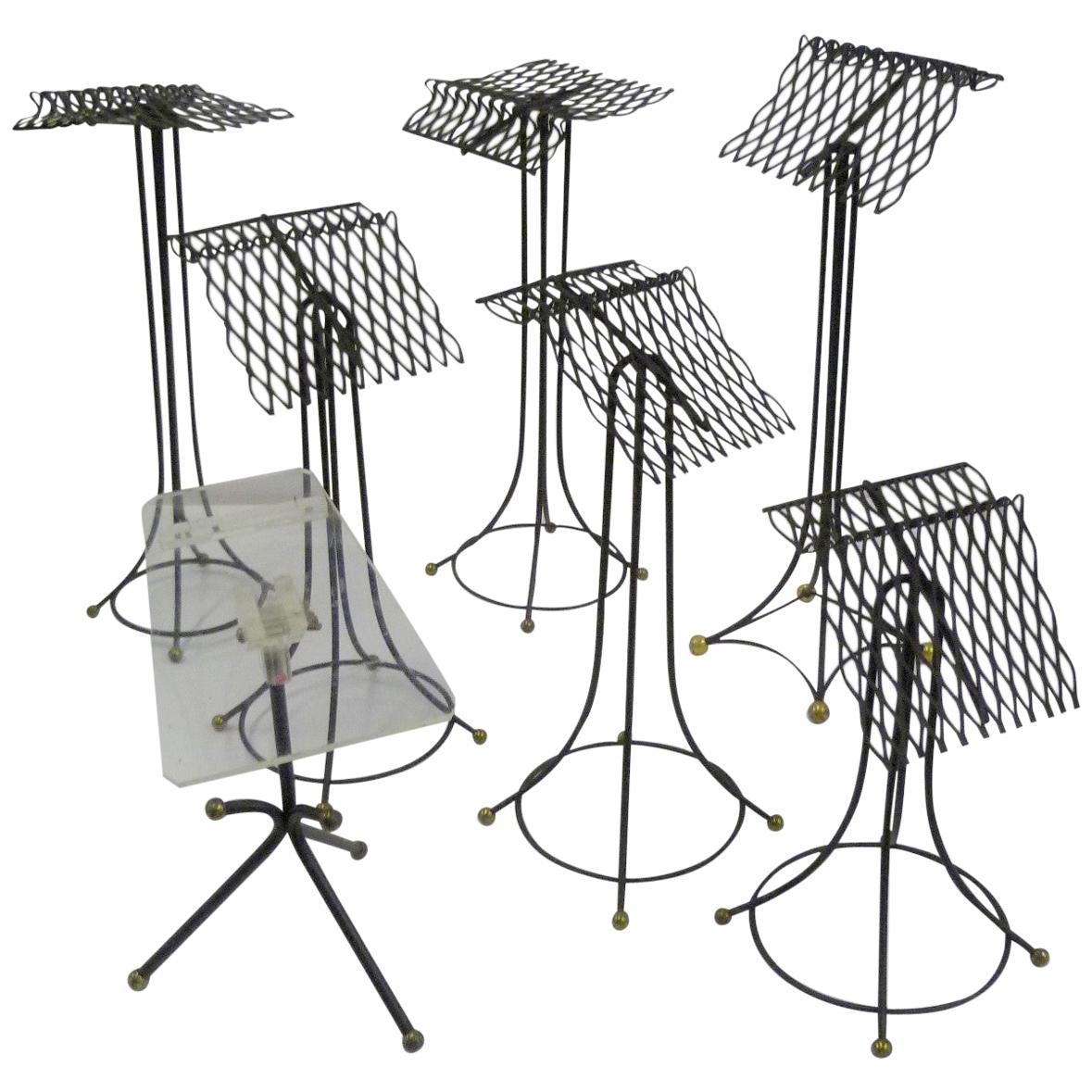 Sculptural Group of 7 Modern Black Wire Store Display Stands, 1930s-1940s