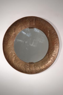 Espejo escultórico de cobre martillado atribuido a Angelo Bragalini".