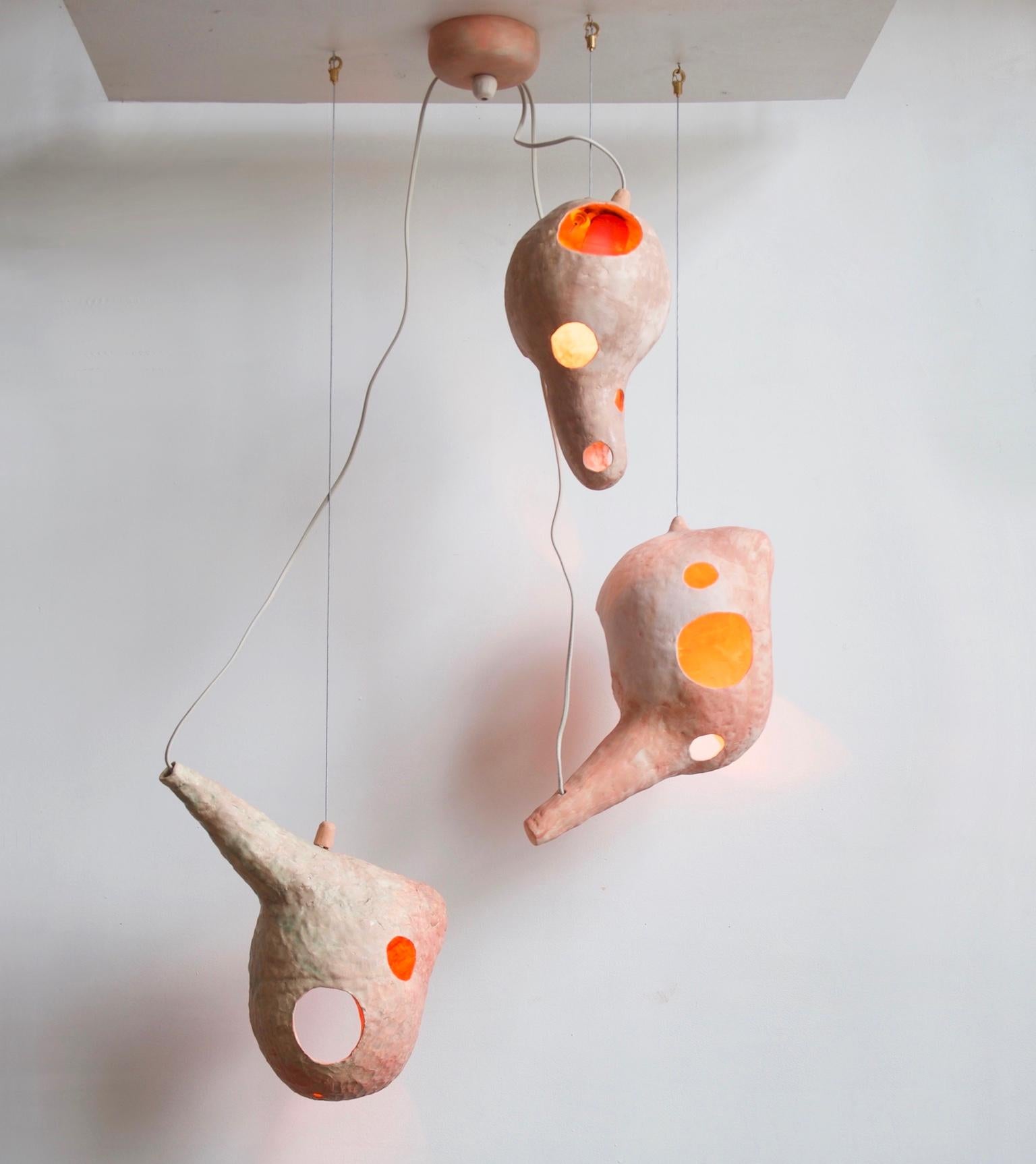 Brah-Voh - Eck-Oh - Foks-Trot is a pendant lamp with three You See a Sheep ceramic shells - Brah-Voh, Eck-Oh and Foks-Trot - installed with a single canopy.

You See a Sheep is a lighting collection that uses hand-built ceramic shells to house the