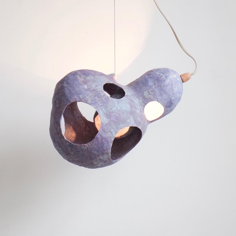 Floating objects surround you. You wonder if you too are floating in space, or perhaps in water. Gravity, the horizon, and the edges of the room disappear. You are happy.

Too-Fife is a pendant lamp from You See a Sheep, a lighting collection that