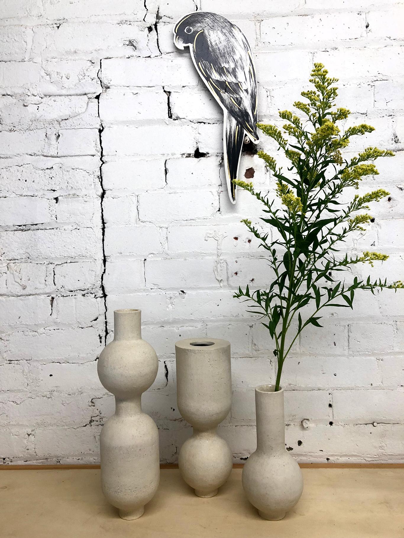 This exquisite sculptural ceramic stoneware BBL-5 Vessel by Humble Matter is hand-built out of an off-white textured stoneware with a smooth semi-matte glaze, which reflects a subtle hue that changes with the light. The piece measures 8