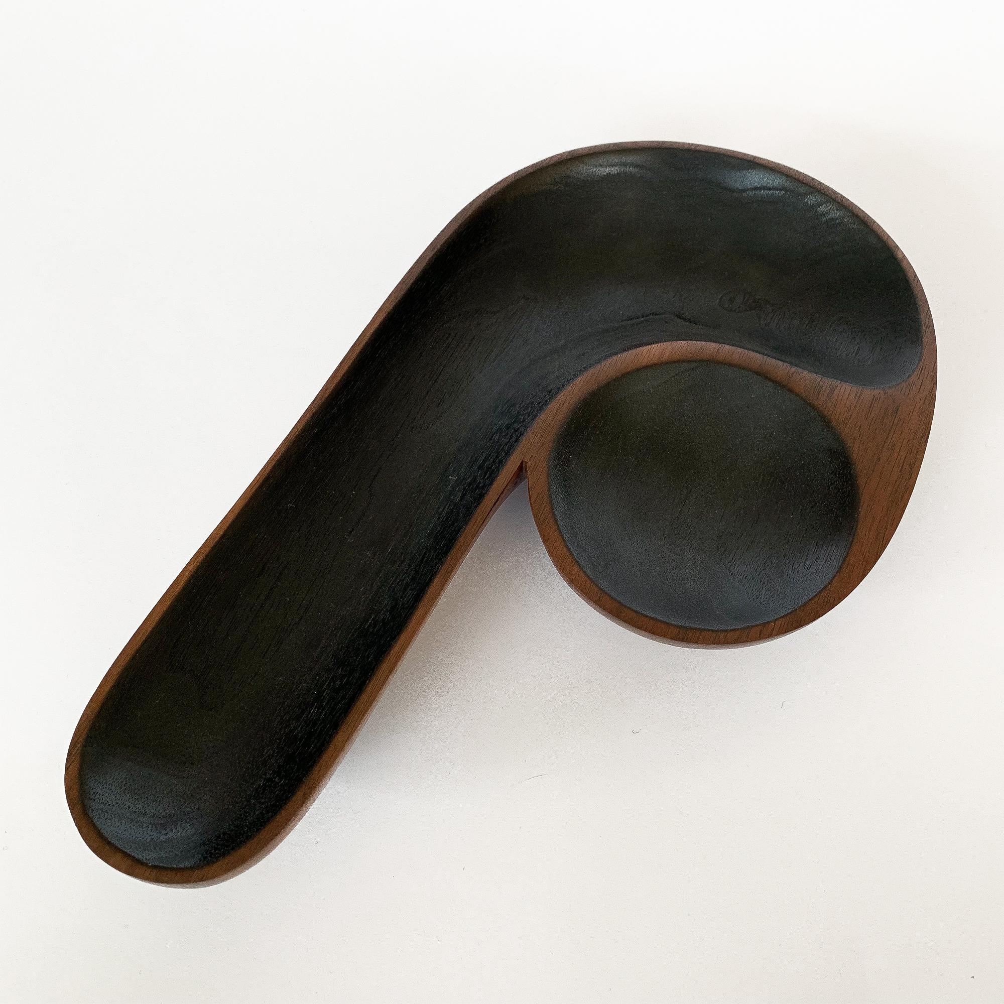Large sculptural hand carved black ebonized walnut bowl from the Native Tongue collection by Foxwood Co. Foxwood Co. is the work of Casey Reed Johnson, a designer and sculptor whose work is inspired by function and driven by form. His current work