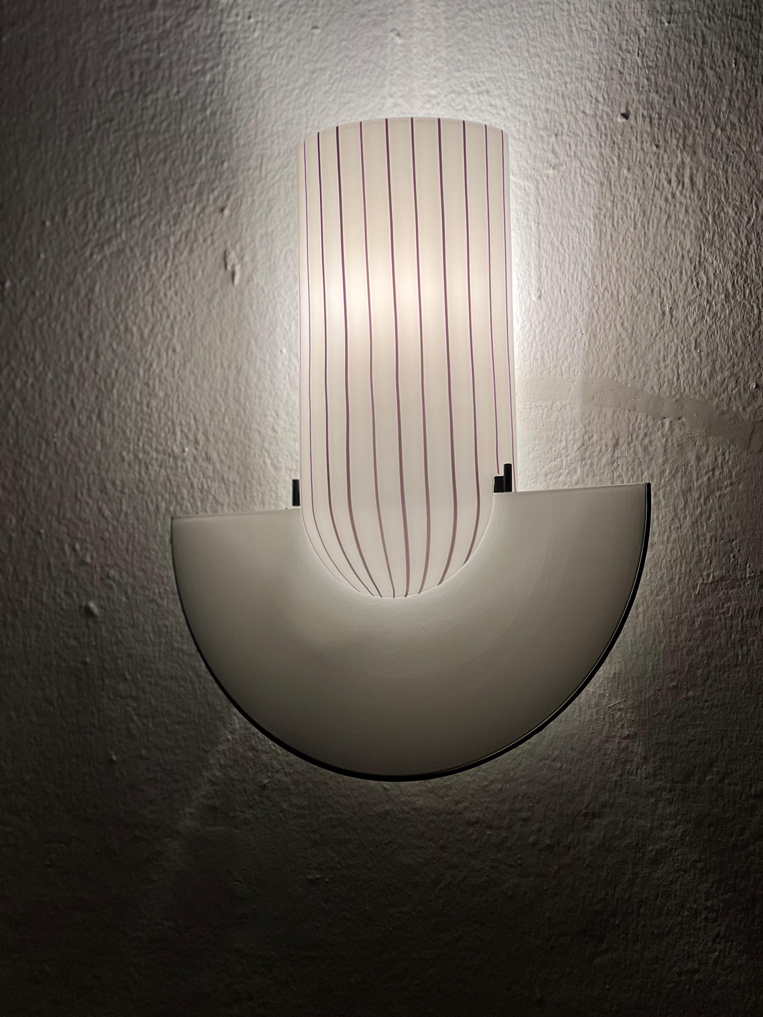 Vintage Murano Lamps - Art Glass Wall Lights - Italian Mid Century Sconce

Unique and rare  Mid-Century Modern flush mount lamp by Vistosi, . Suitable for wall  mount, these simple yet decorative lamp is a beautiful example of Iitalian 1960s design,