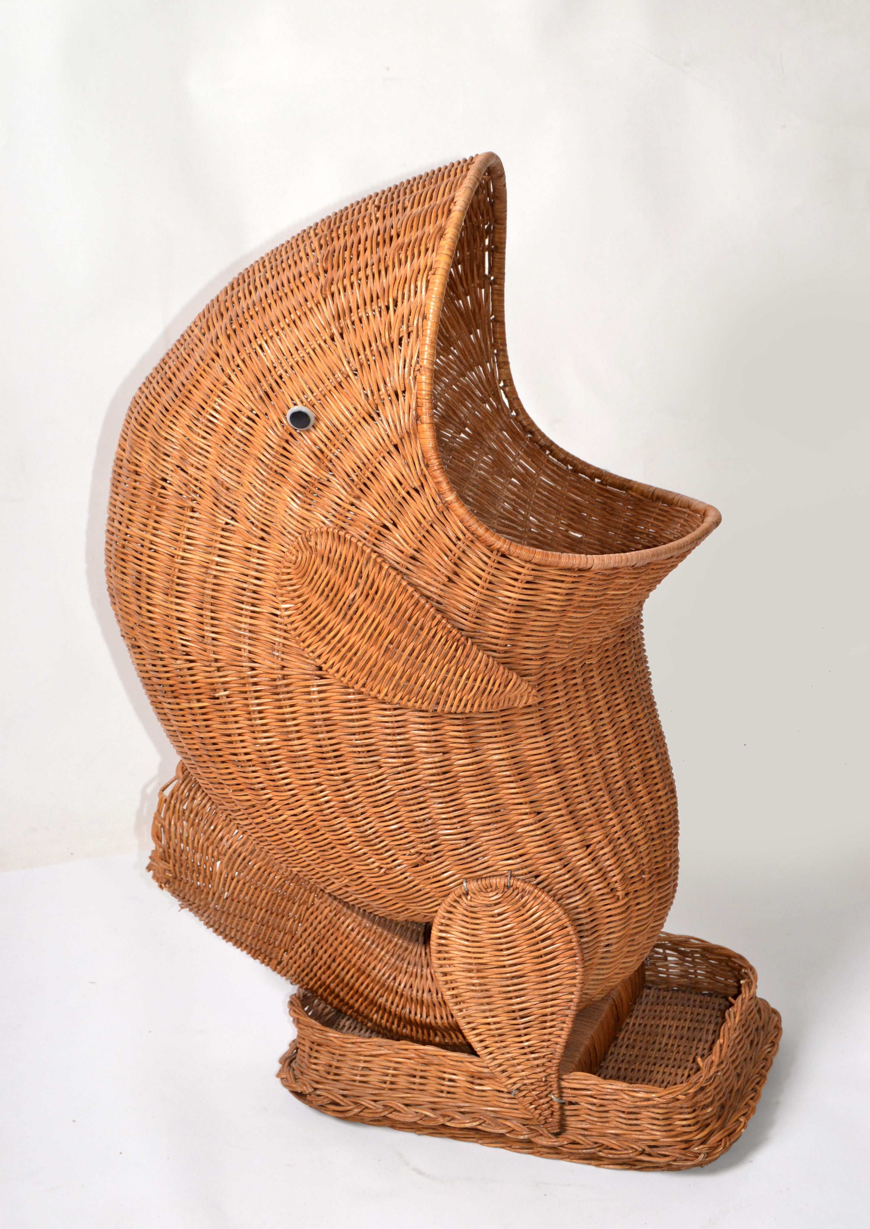 Mario Lopez Torres Style Mid-Century Modern hand-woven Dolphin Basket, Toy Storage Vessel, Animal Sculpture.
Bohemian Style made in America in the late 20th Century.
All original condition with some white marks to the Rattan and some breaks at the