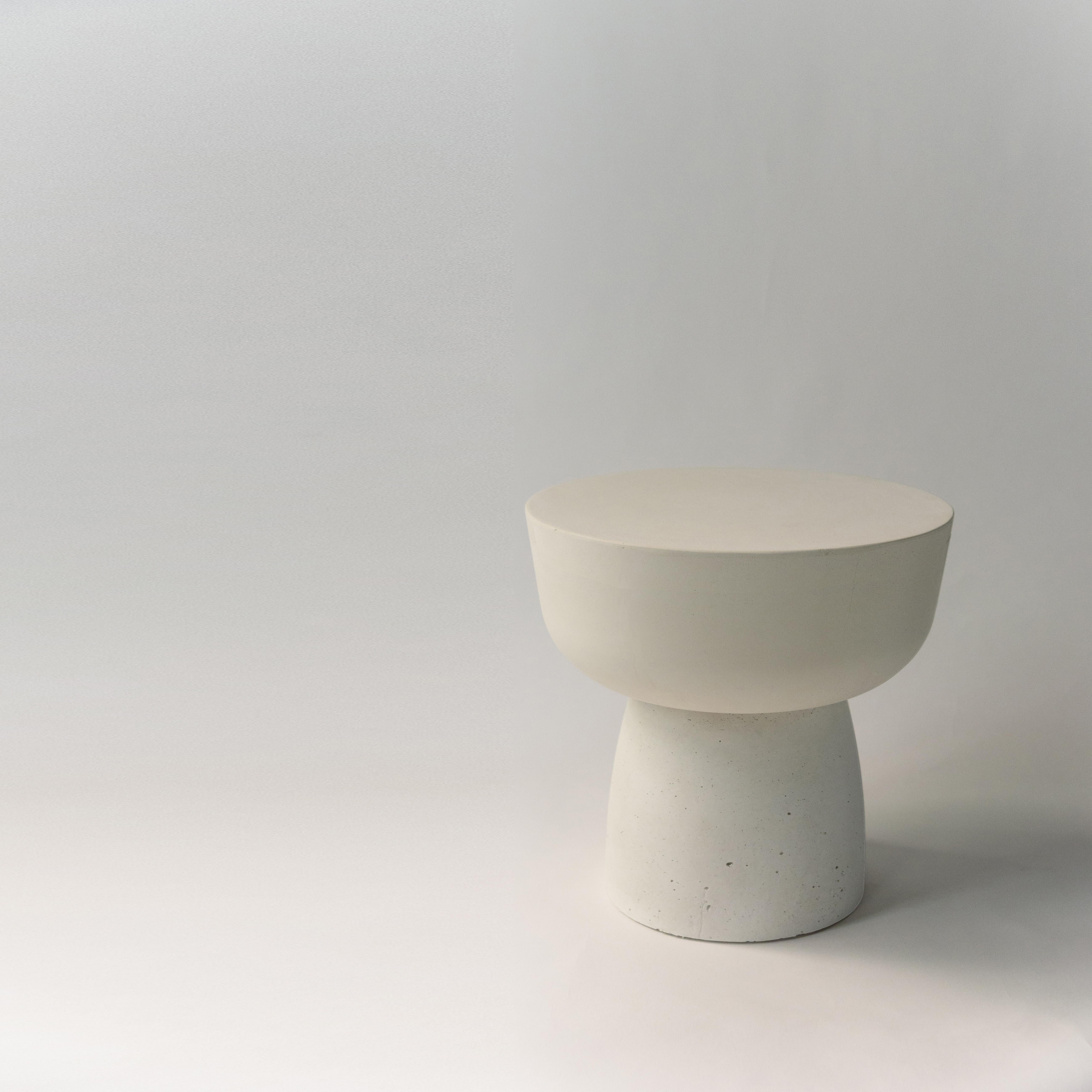 European 21st century contemporary sculptural handmade concrete, marble & stone table 'MUSHROOM SOLID' size low in white.

Mushroom table is part of our mono-material object collection. A rather sculptural piece of furniture, it is both dominant