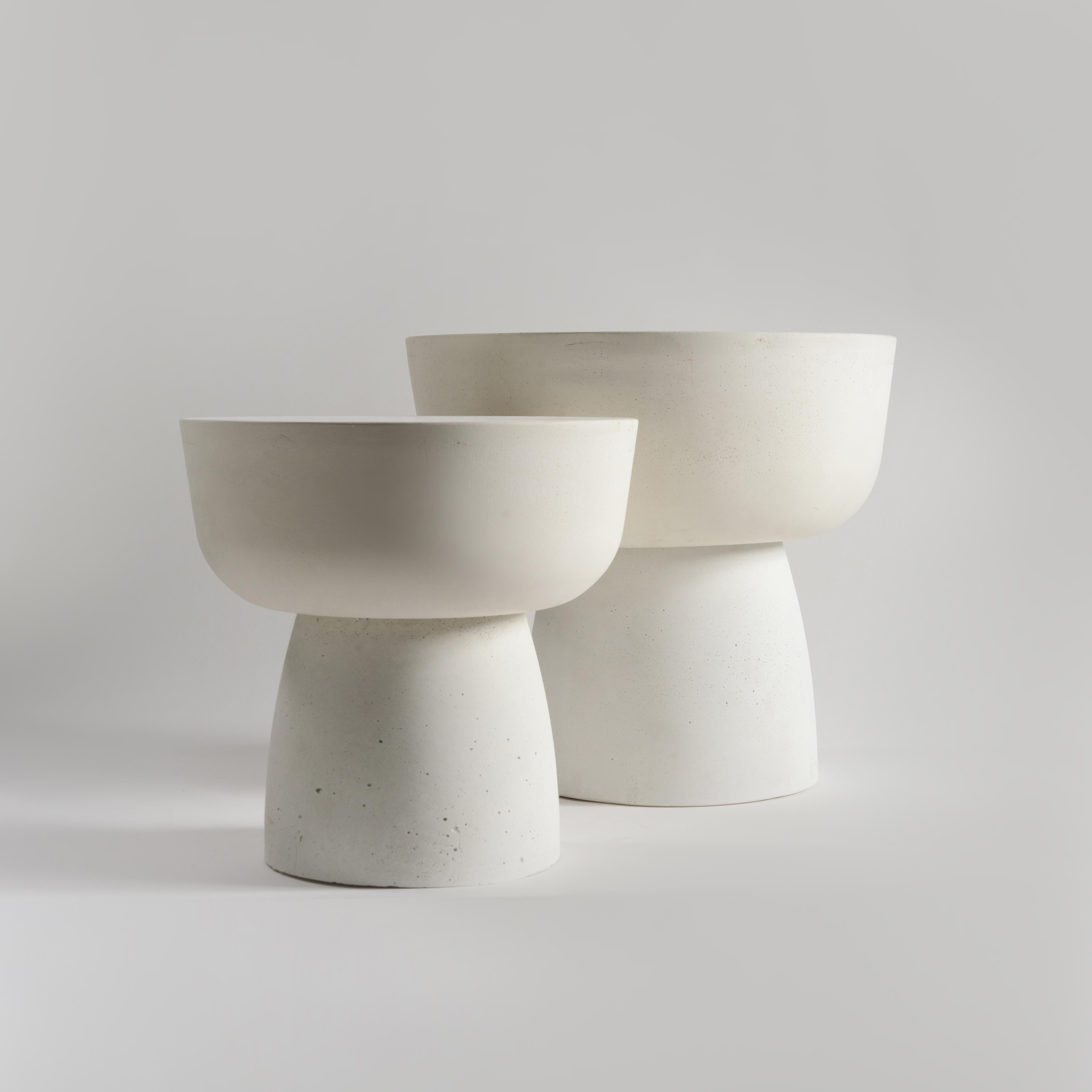 European 21st century contemporary sculptural handcrafted in white cast stone table set MUSHROOM SOLID size TALL and LOW.

The 'Mushroom Solid' table is part of our mono-material object collection. A rather sculptural piece of furniture, it is both