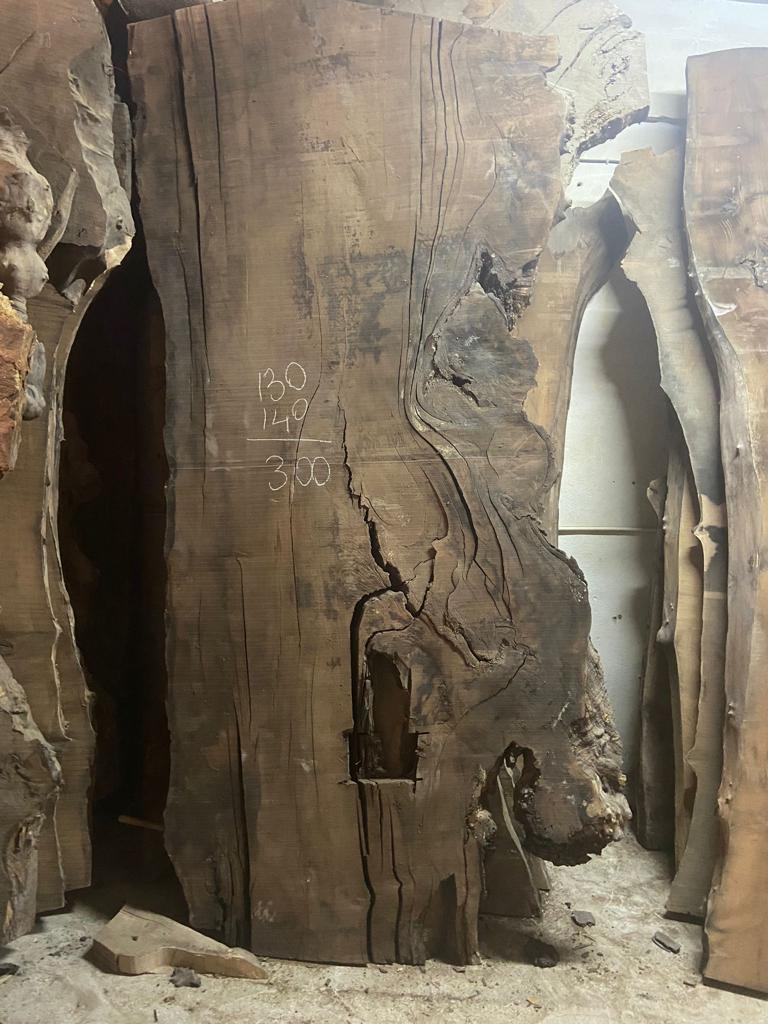 Hand-Carved Sculptural Hexagonal Dining Table in Solid One Piece Walnut with a Gray Epoxy For Sale