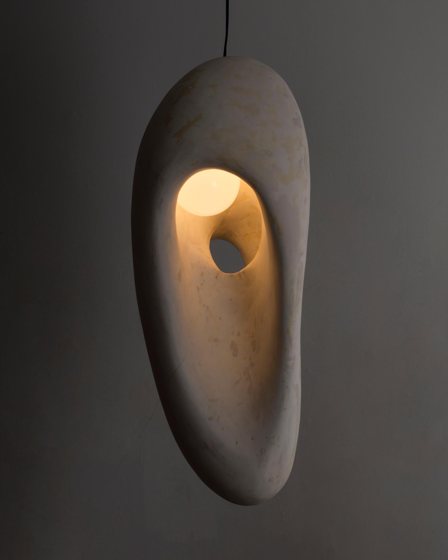 Sculptural illuminated form in surfboard foam. Designed and made by Rogan Gregory, USA, 2022.