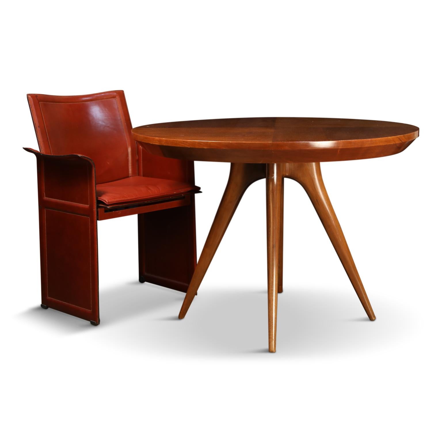 Reminiscent of his earlier work with Kagan-Dreyfuss, this gorgeous Vladimir Kagan sculpted leg dining table (or also an amazing choice as a breakfast, center, or game table) was custom produced for a family friend of his in 1998. Sharing similarity