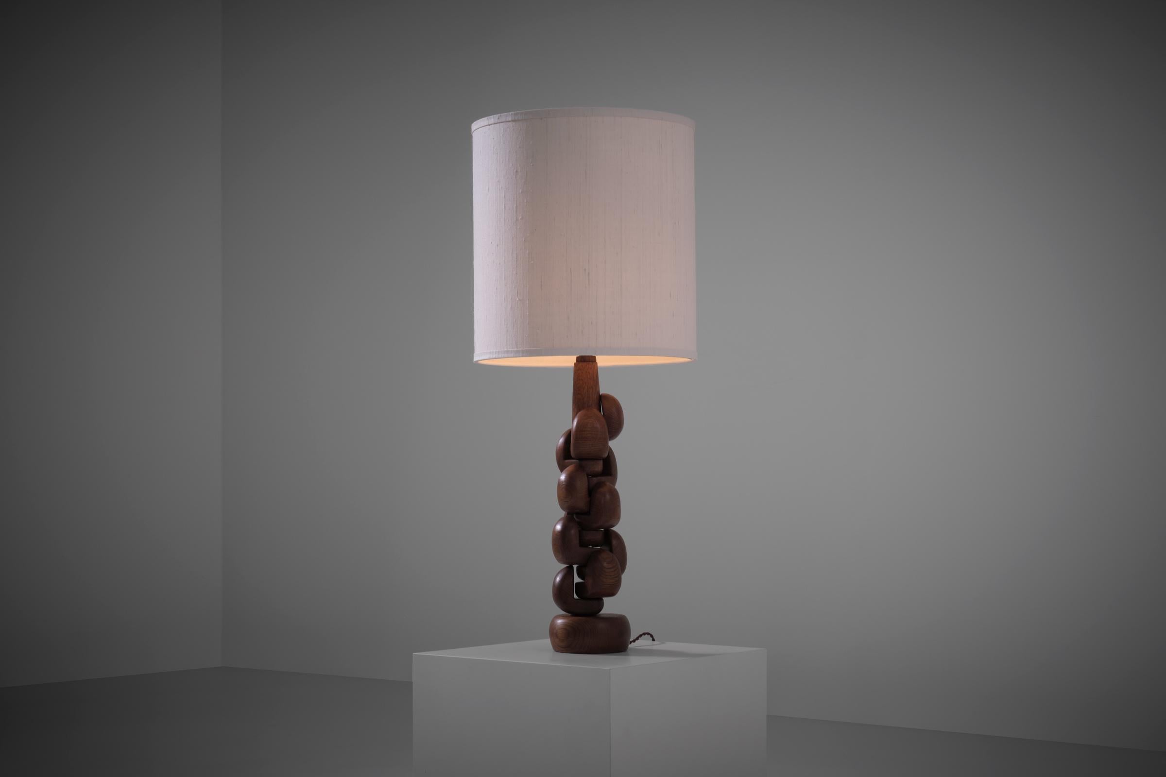 French Sculptural interlocking Oak wooden Table Lamp, France 1960s