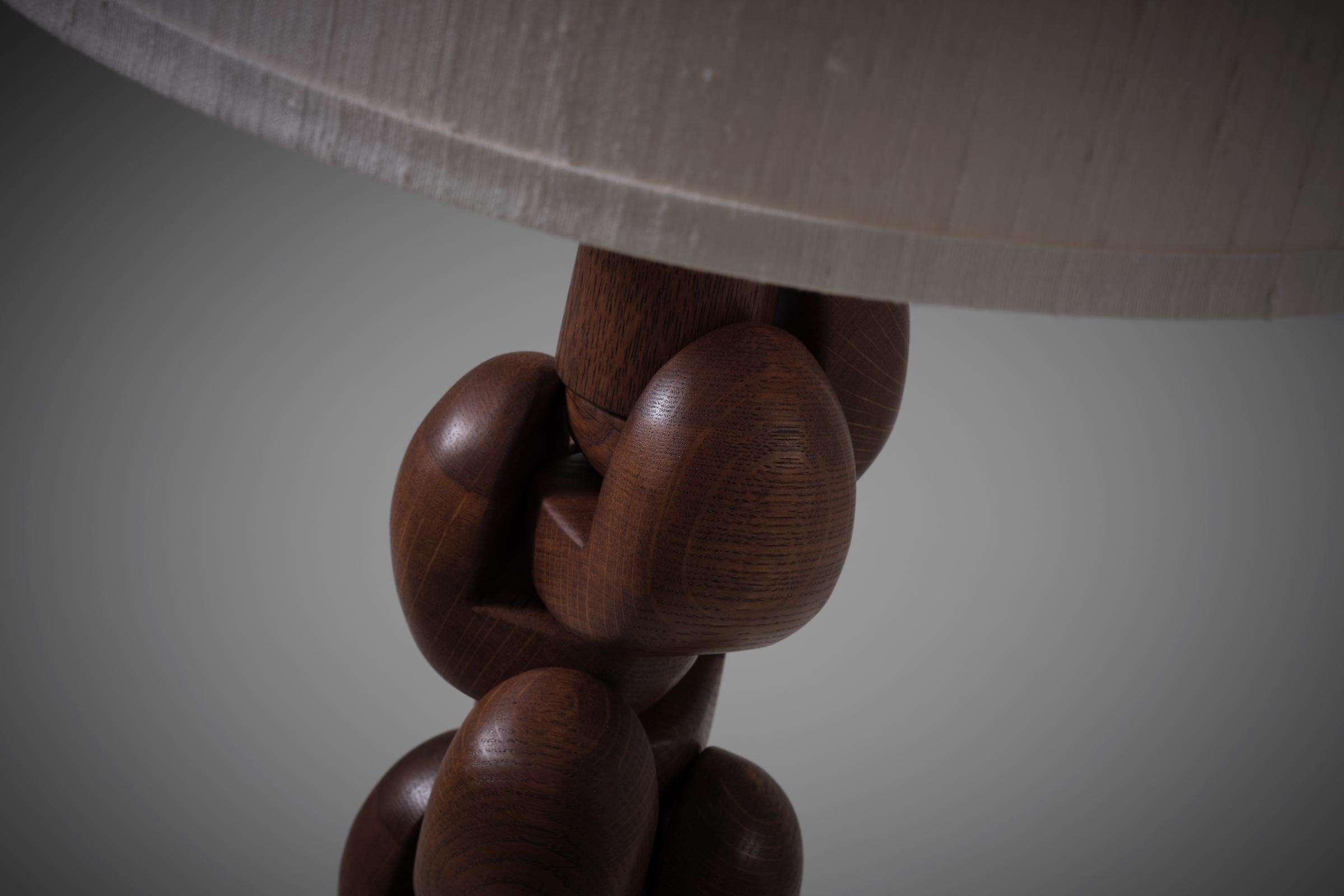 Sculptural interlocking Oak wooden Table Lamp, France 1960s In Good Condition In Rotterdam, NL